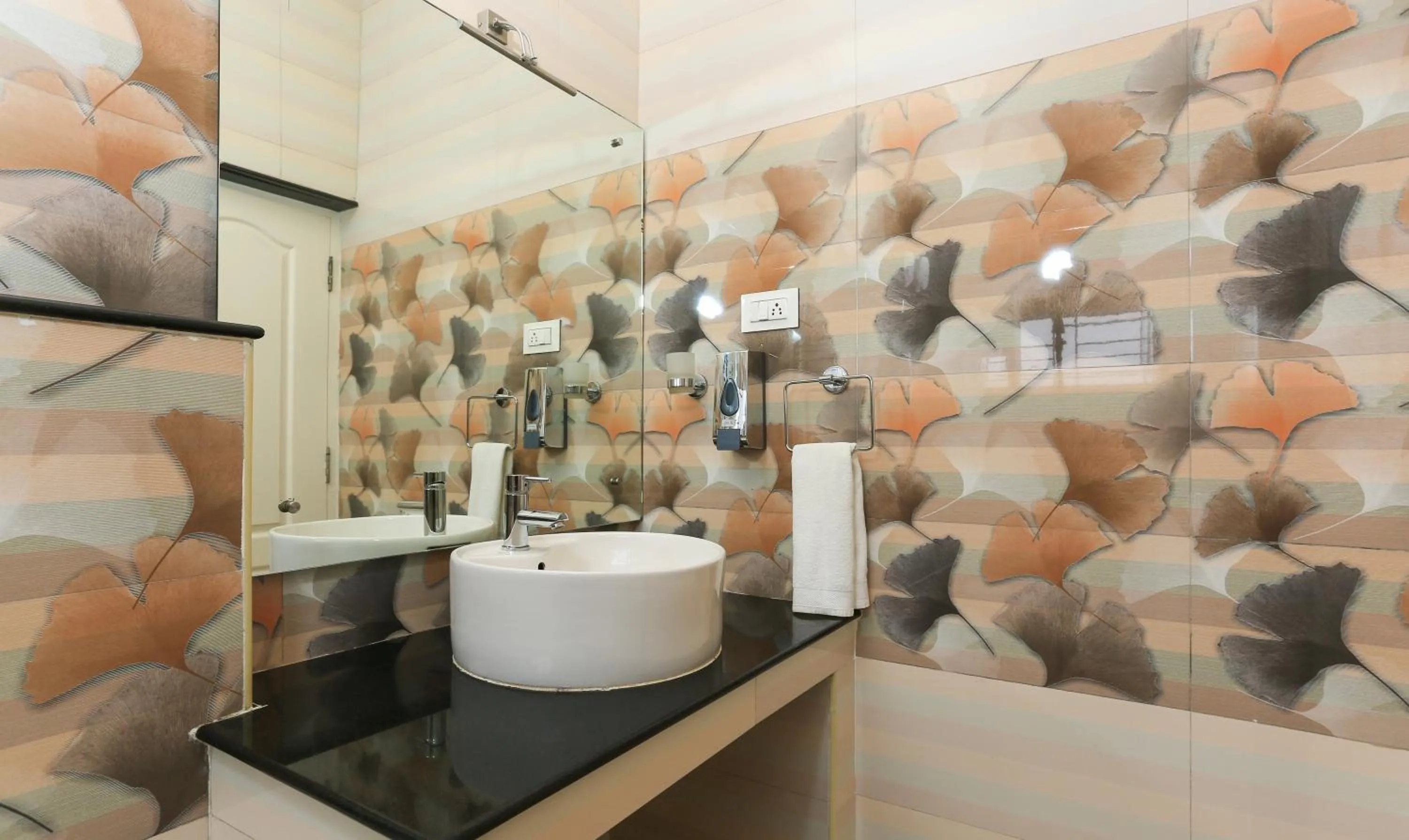 Bathroom in Treebo Light House, 900 Mtrs From Botanical Garden