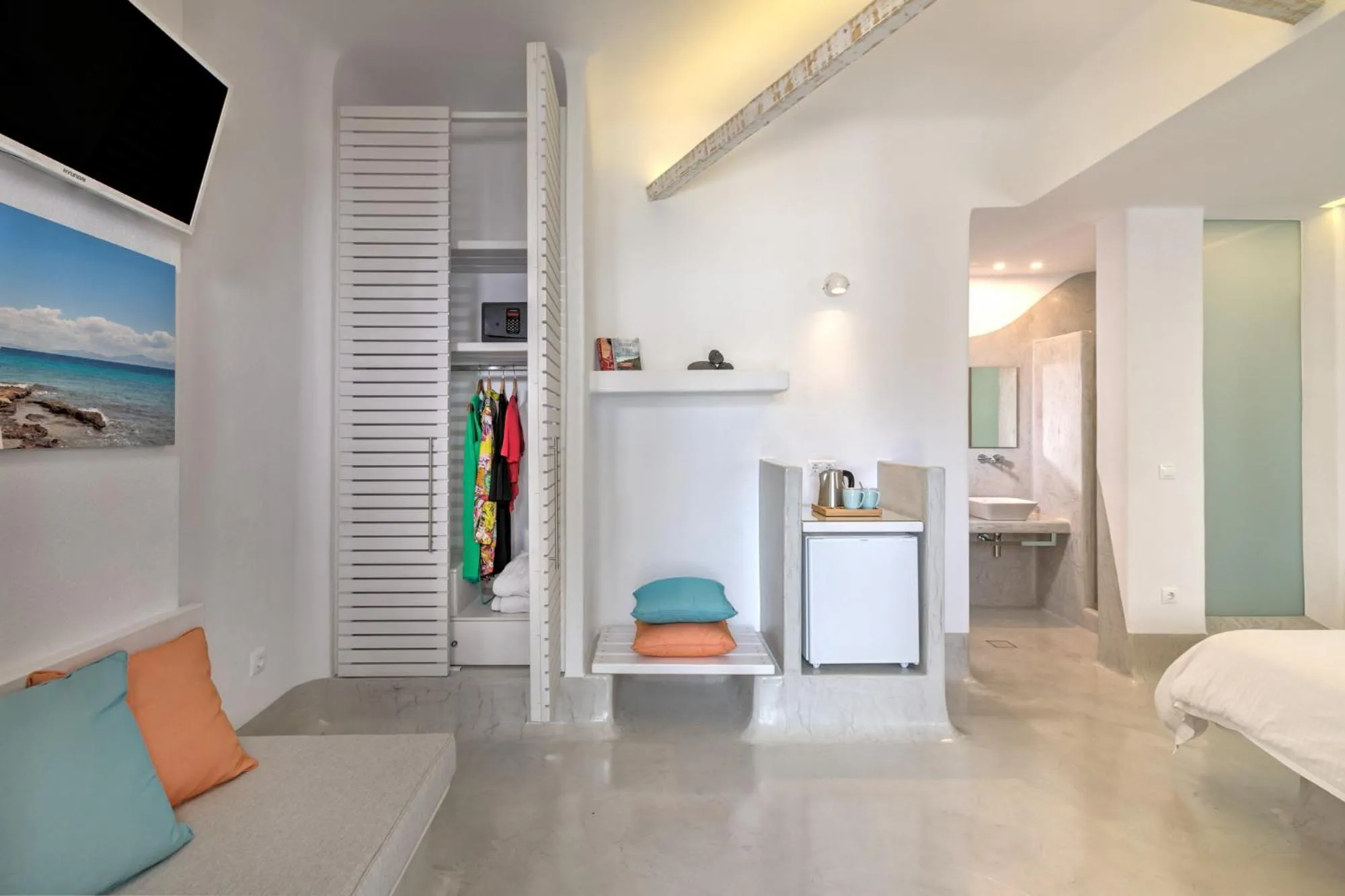 Coffee/tea facilities, Bed in Kouros Village Hotel - Adults Only