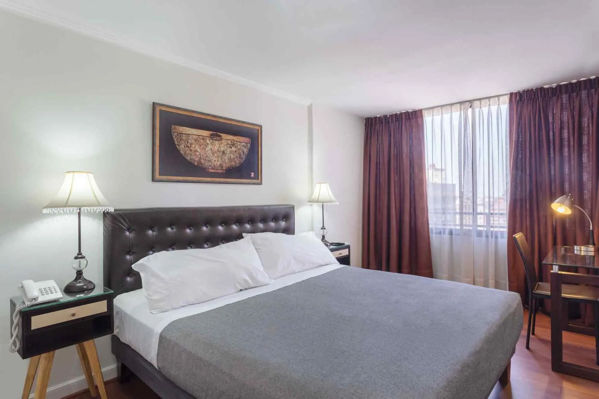 Bed in Santa Magdalena Apartments