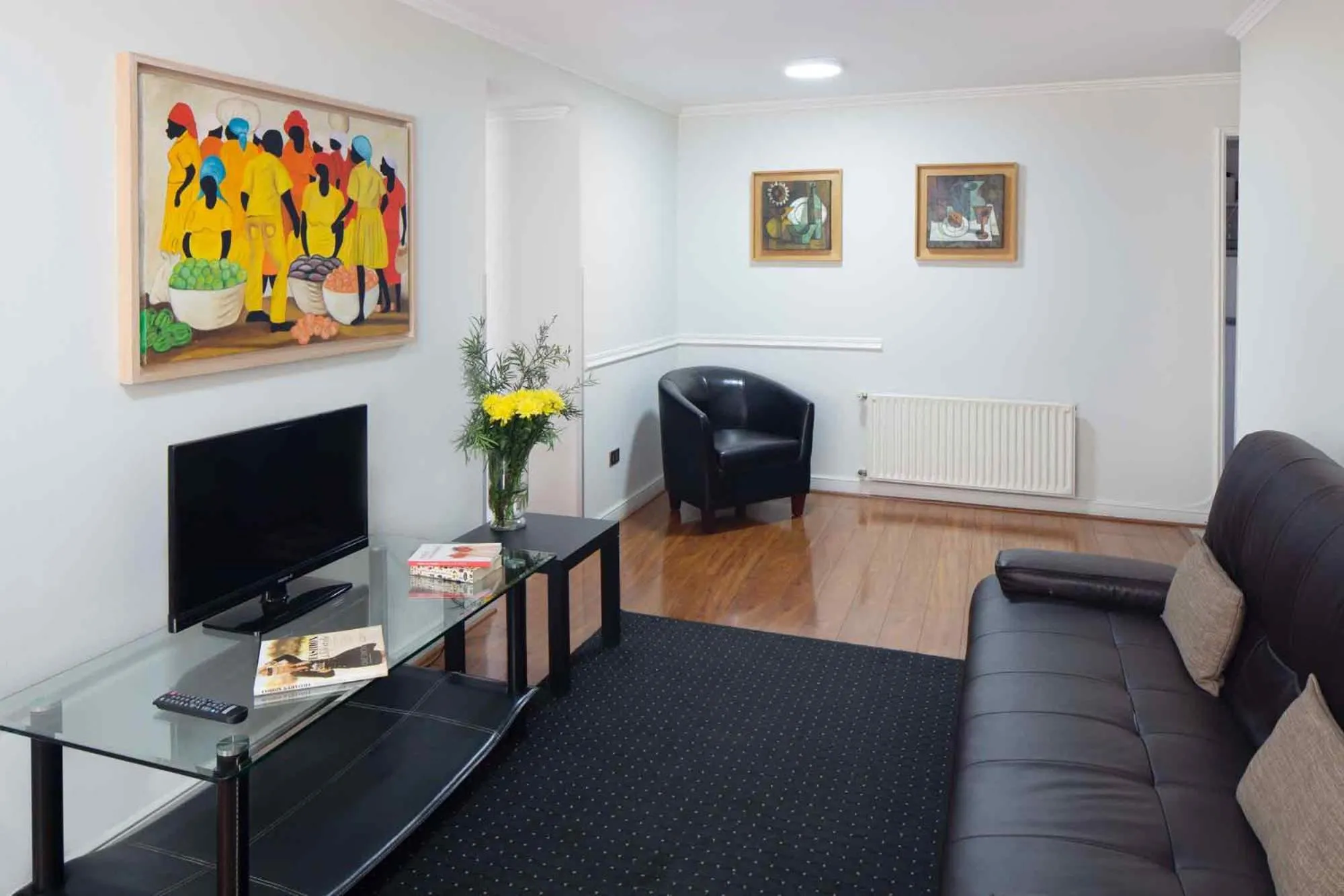 Communal lounge/ TV room in Santa Magdalena Apartments