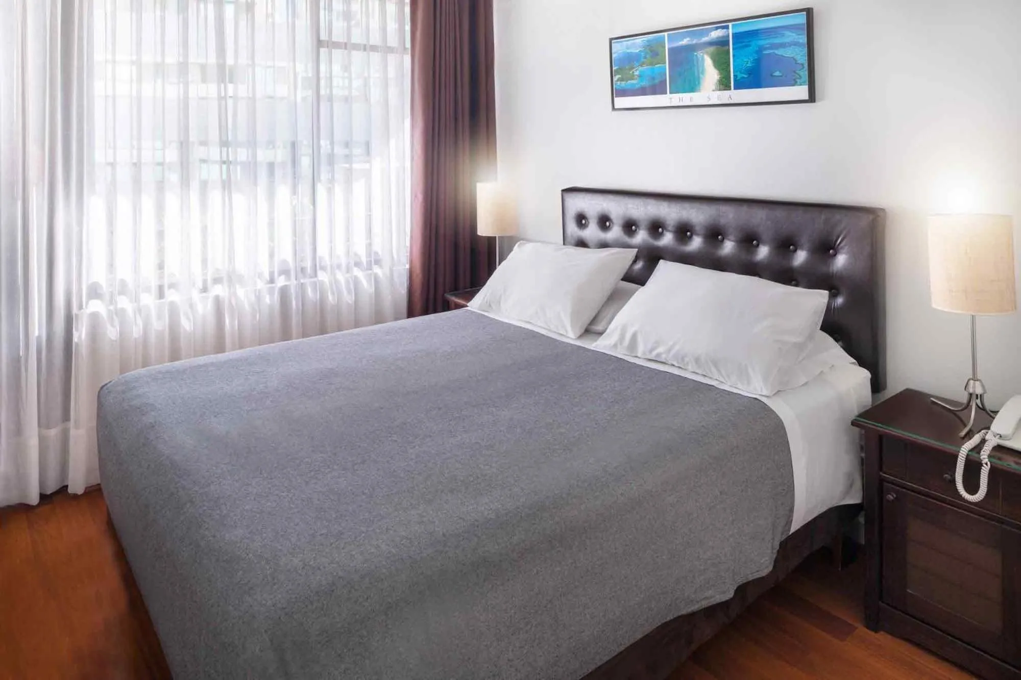 Bed in Santa Magdalena Apartments