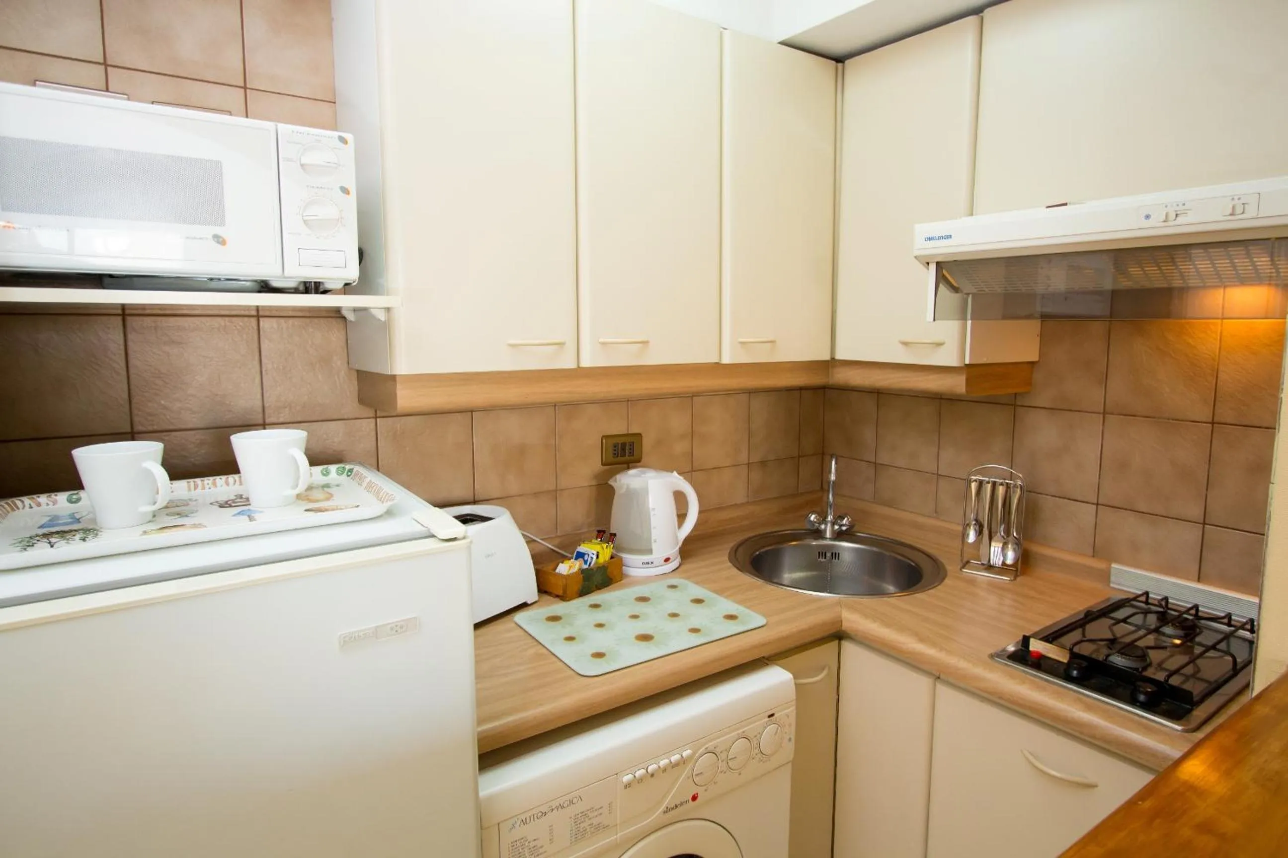 Kitchen or kitchenette in Santa Magdalena Apartments