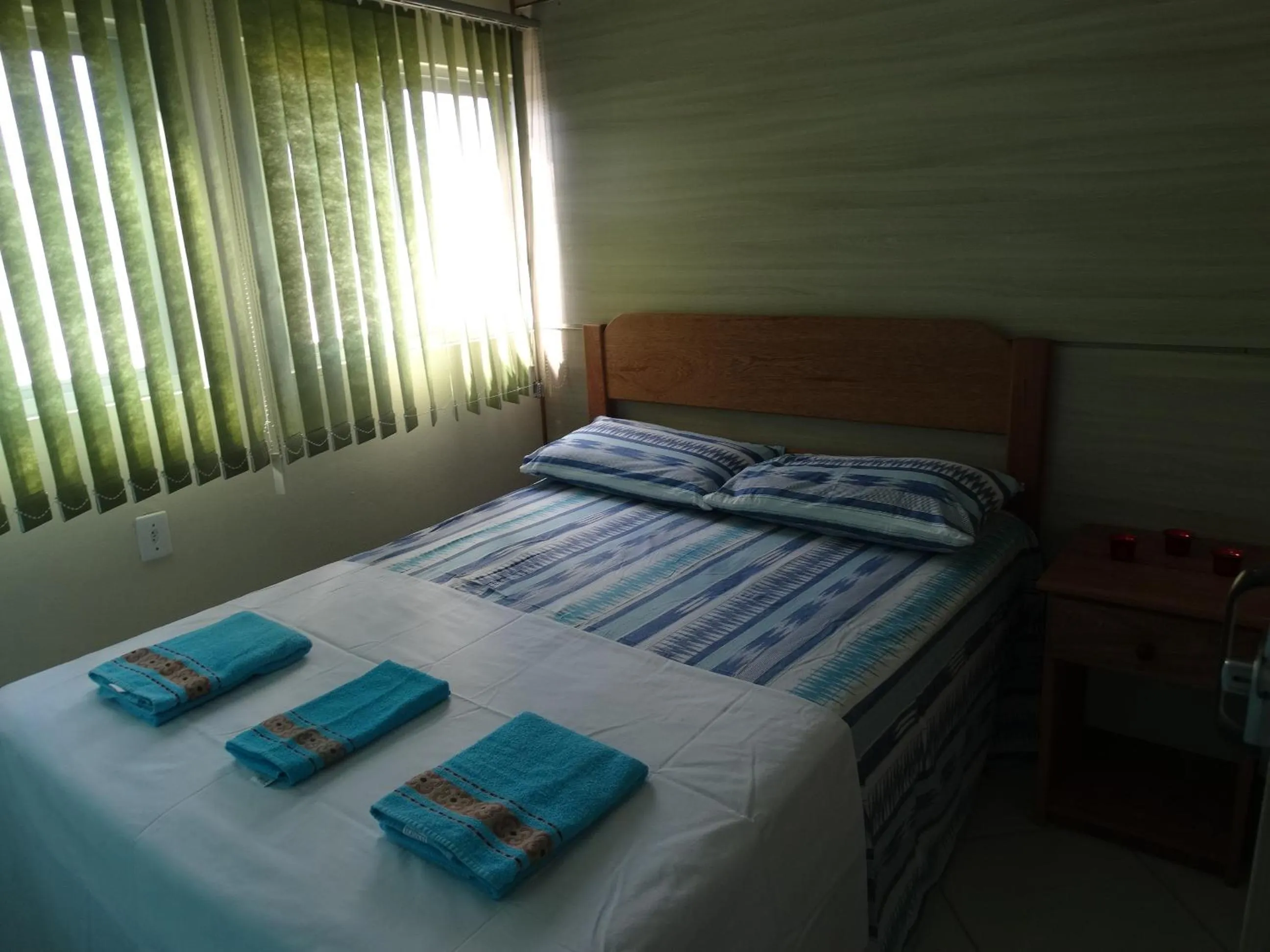 Bed in Pousada Oliveira