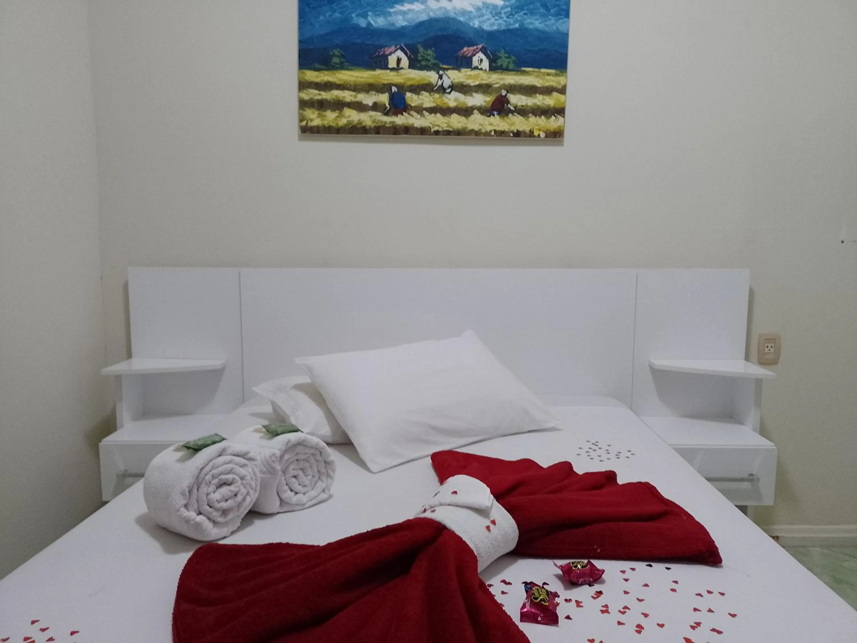 Bed in Pousada Oliveira