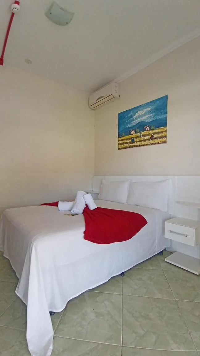 Bedroom in Pousada Oliveira