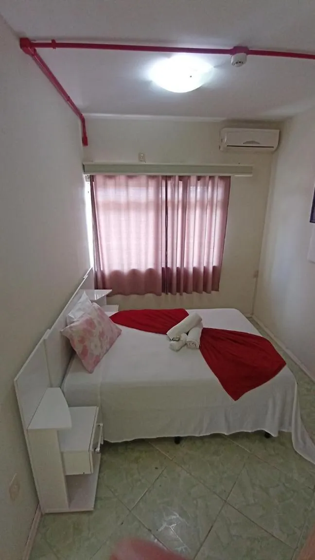 Bed in Pousada Oliveira