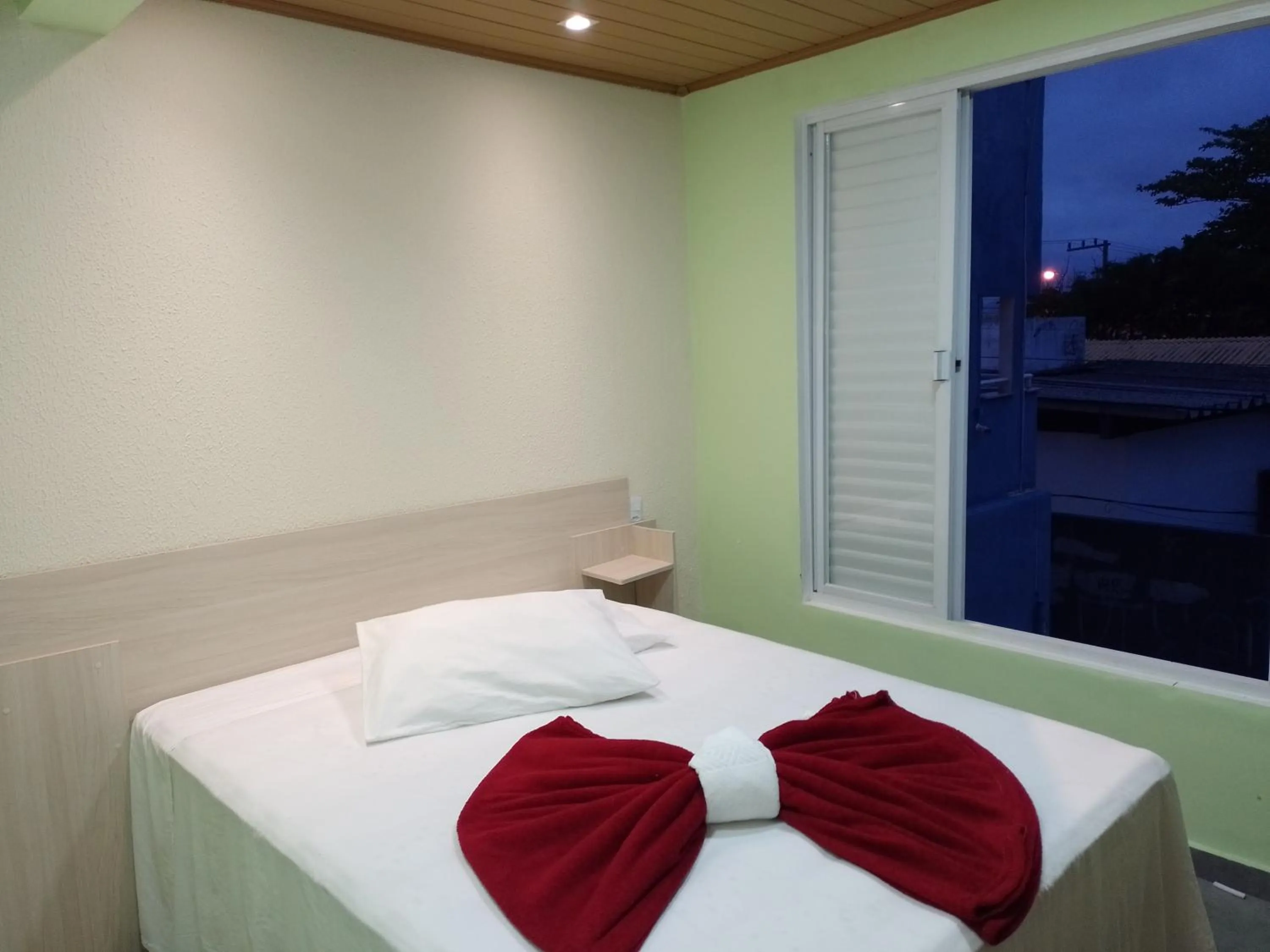 Bedroom in Pousada Oliveira