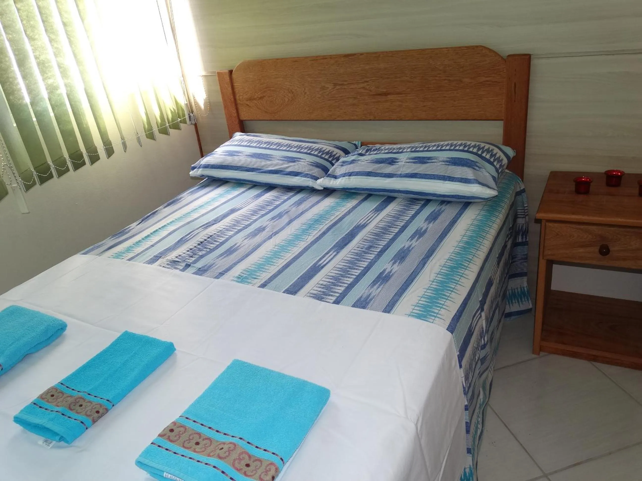 Bed in Pousada Oliveira