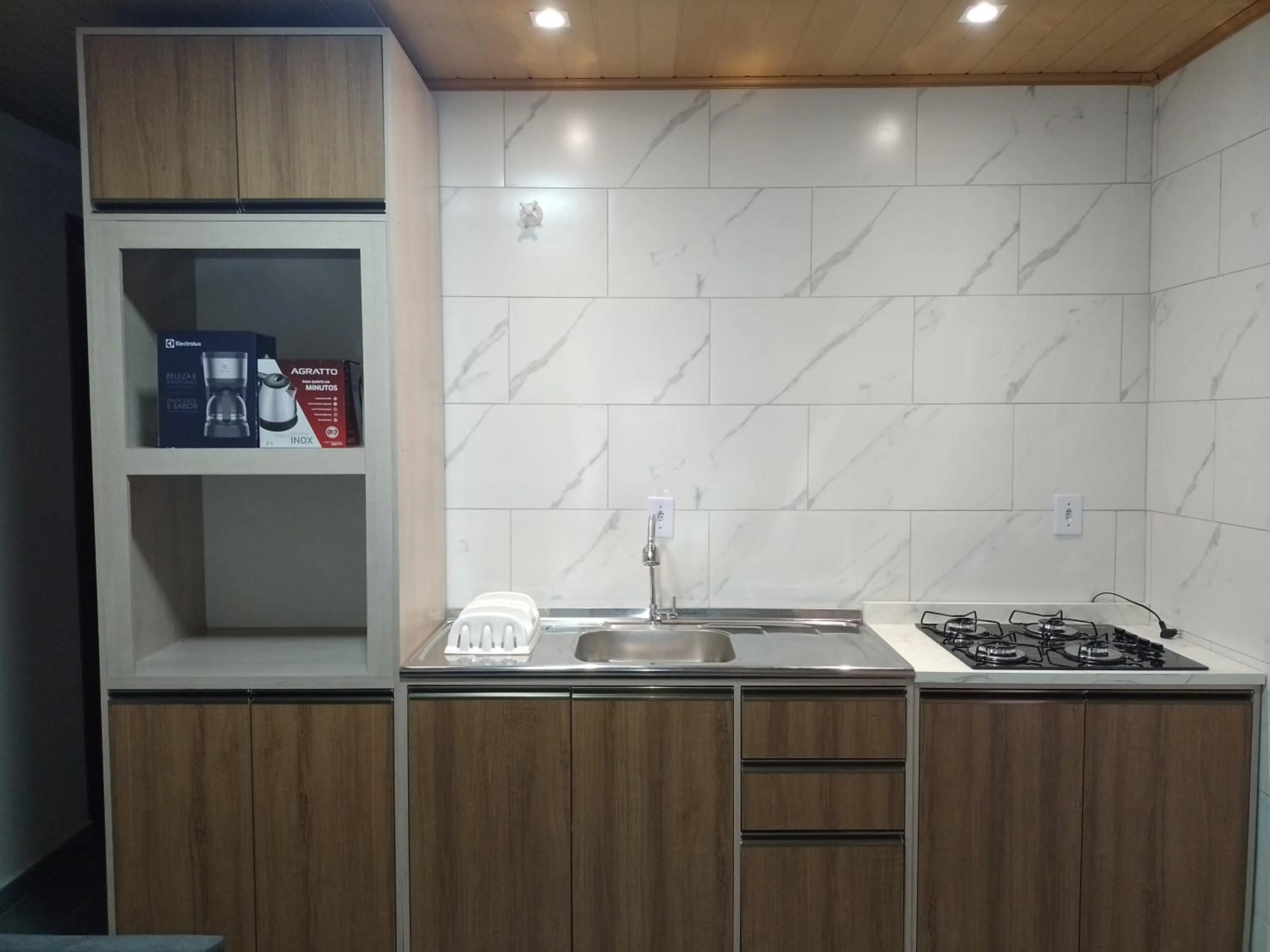 Kitchen or kitchenette in Pousada Oliveira