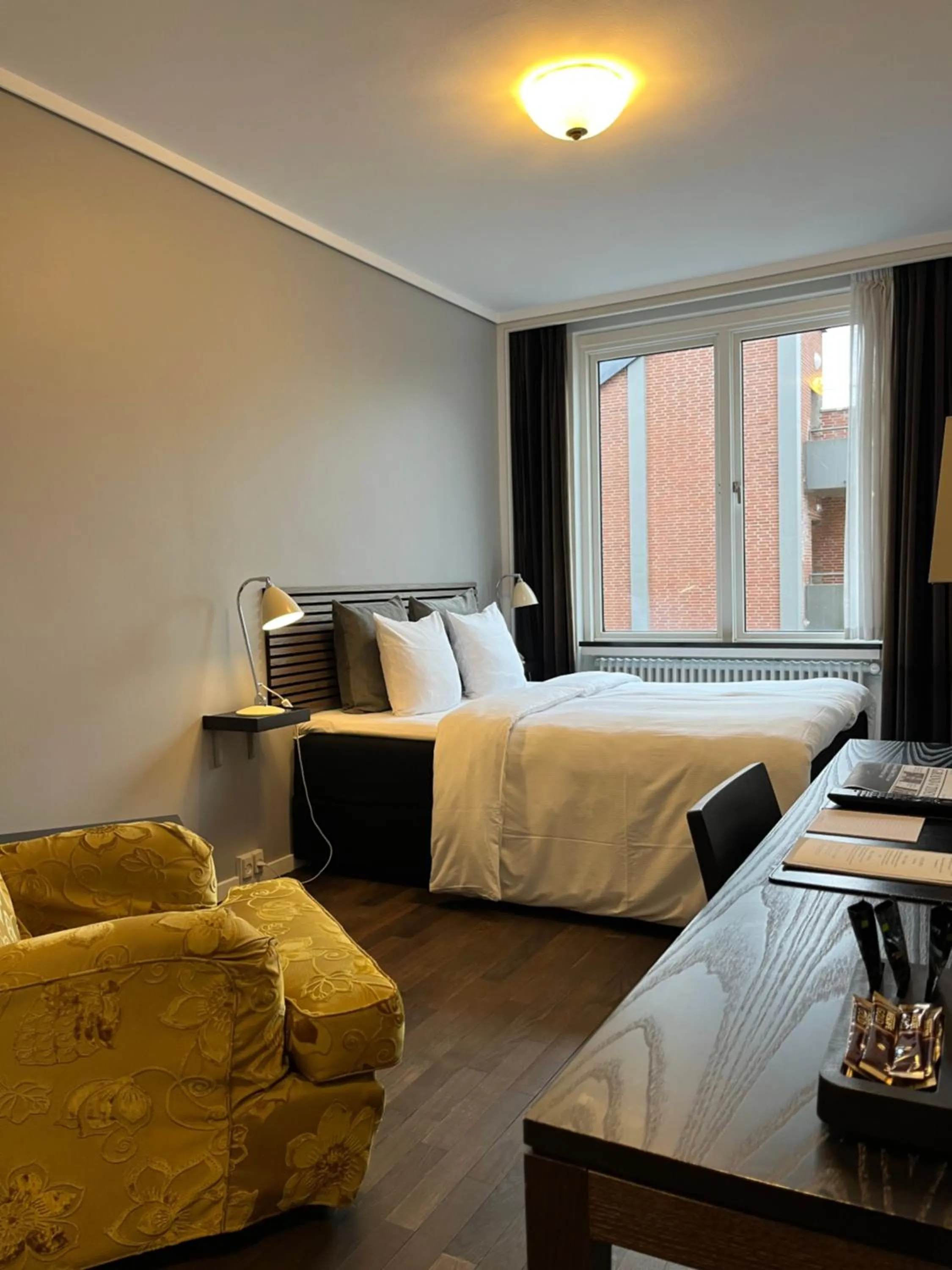 Bed in First Hotel Grand