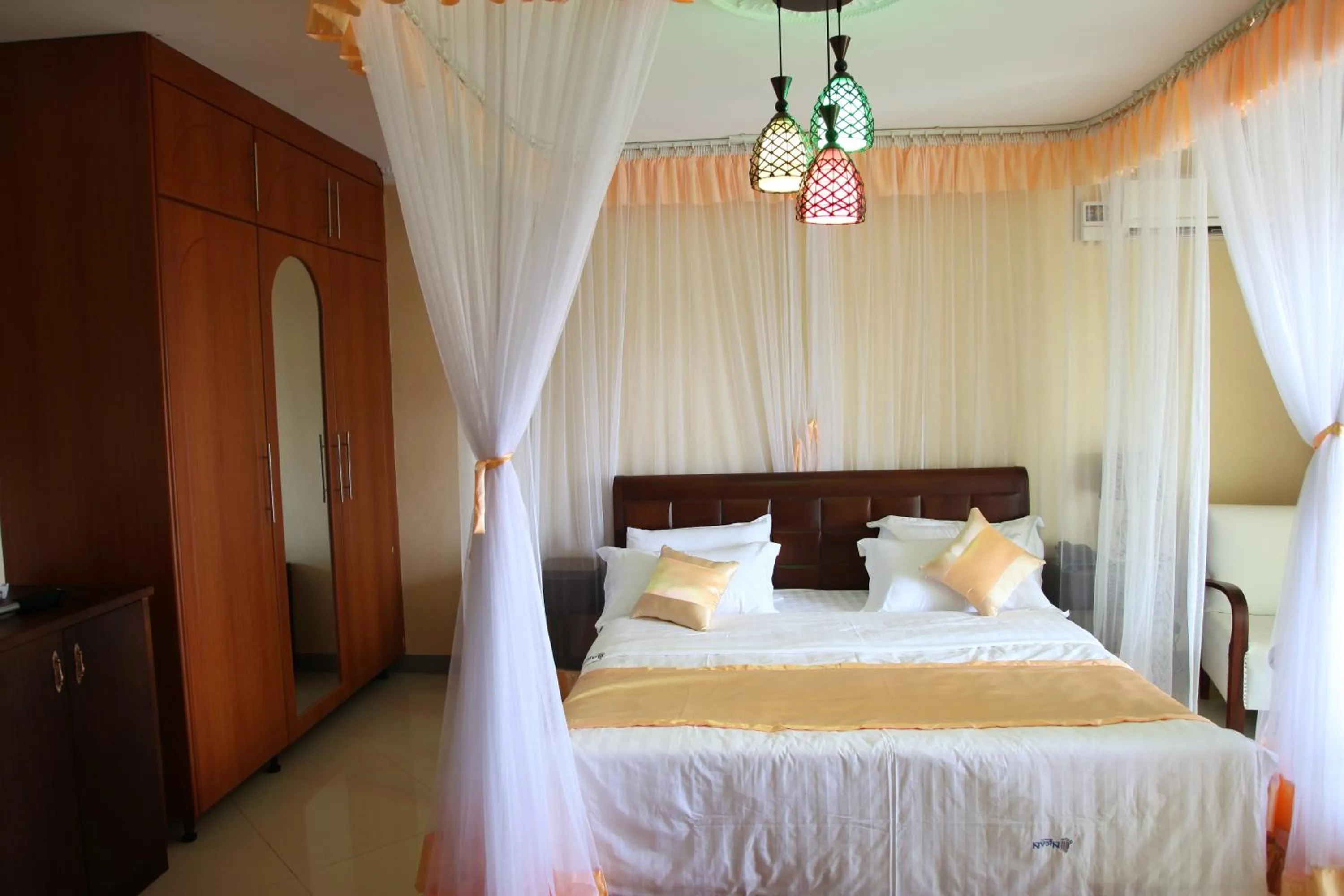 Bed in Nican Resort Hotel Seguku Entebbe