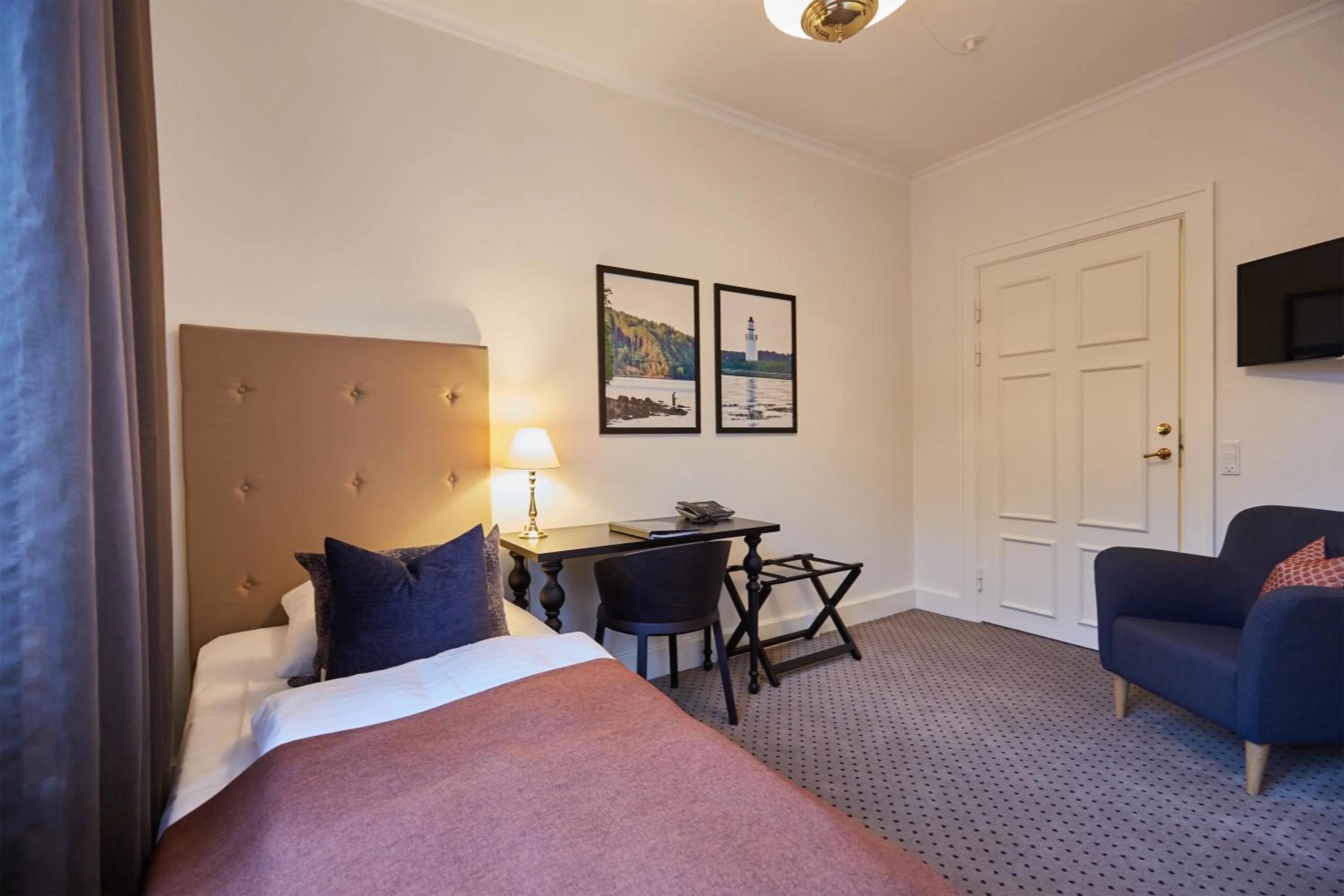 Photo of the whole room, Bed in Hotel Vejlefjord