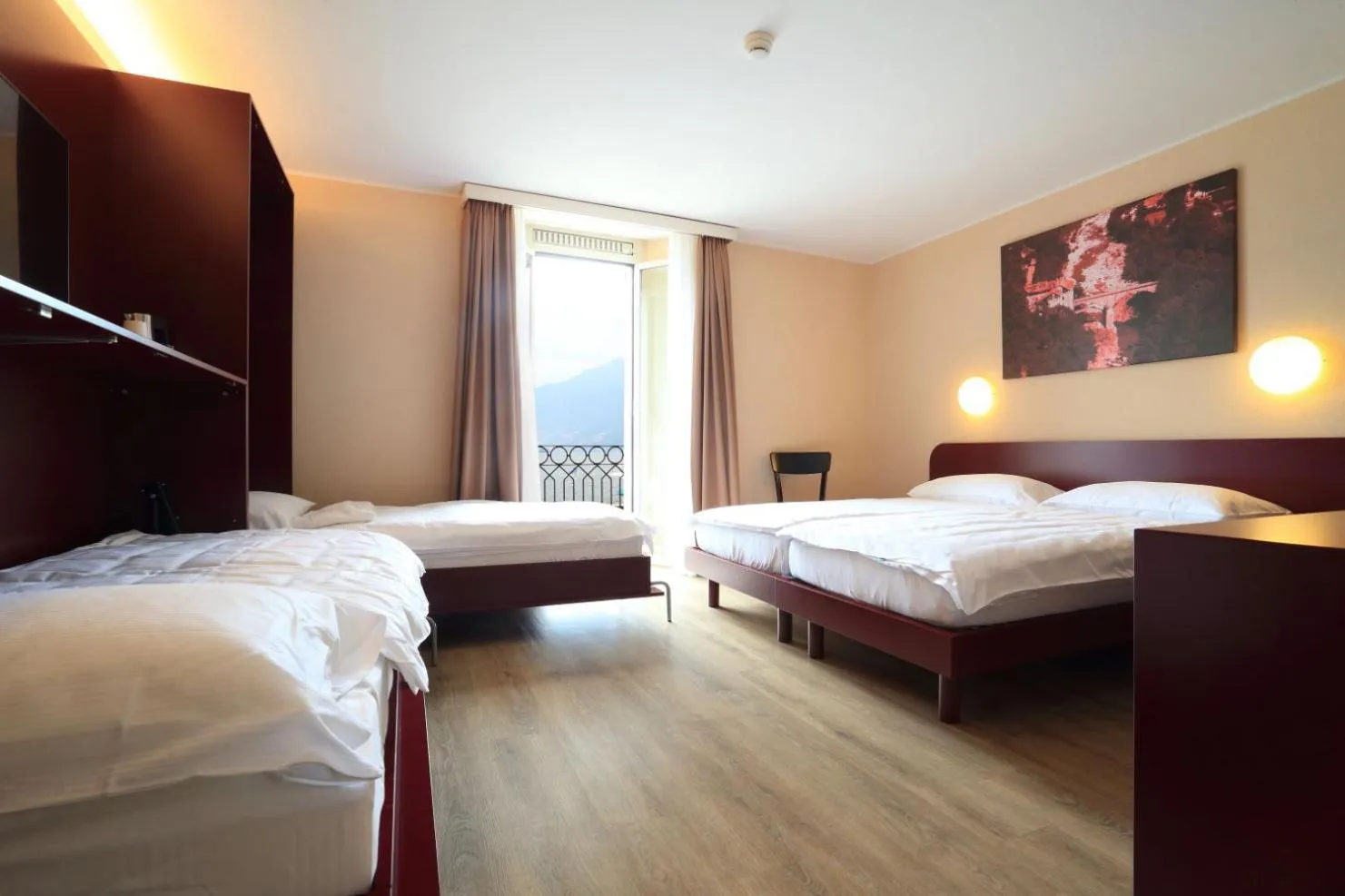 Bed in Hotel Elvezia Ascona