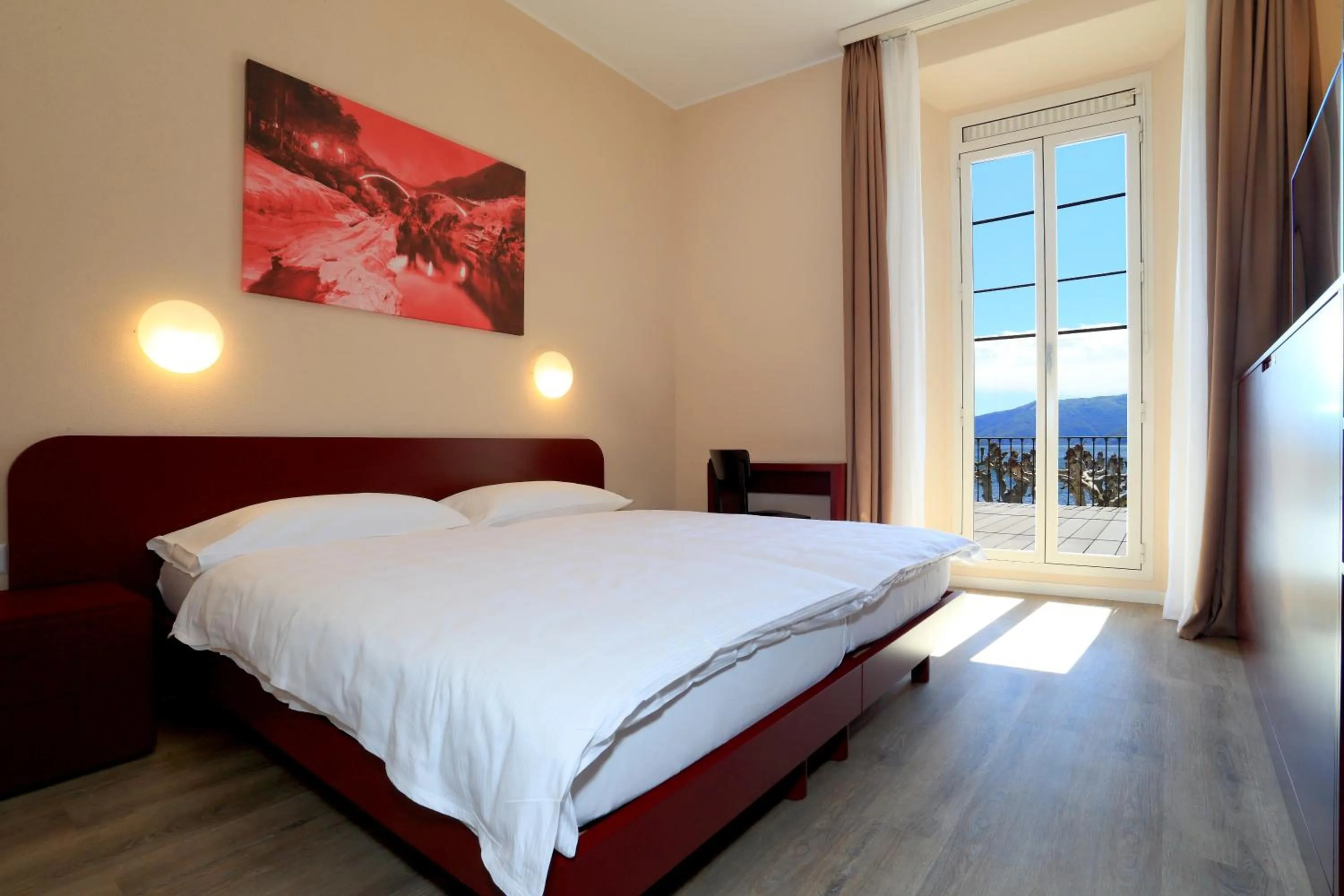 Balcony/Terrace, Bed in Hotel Elvezia Ascona