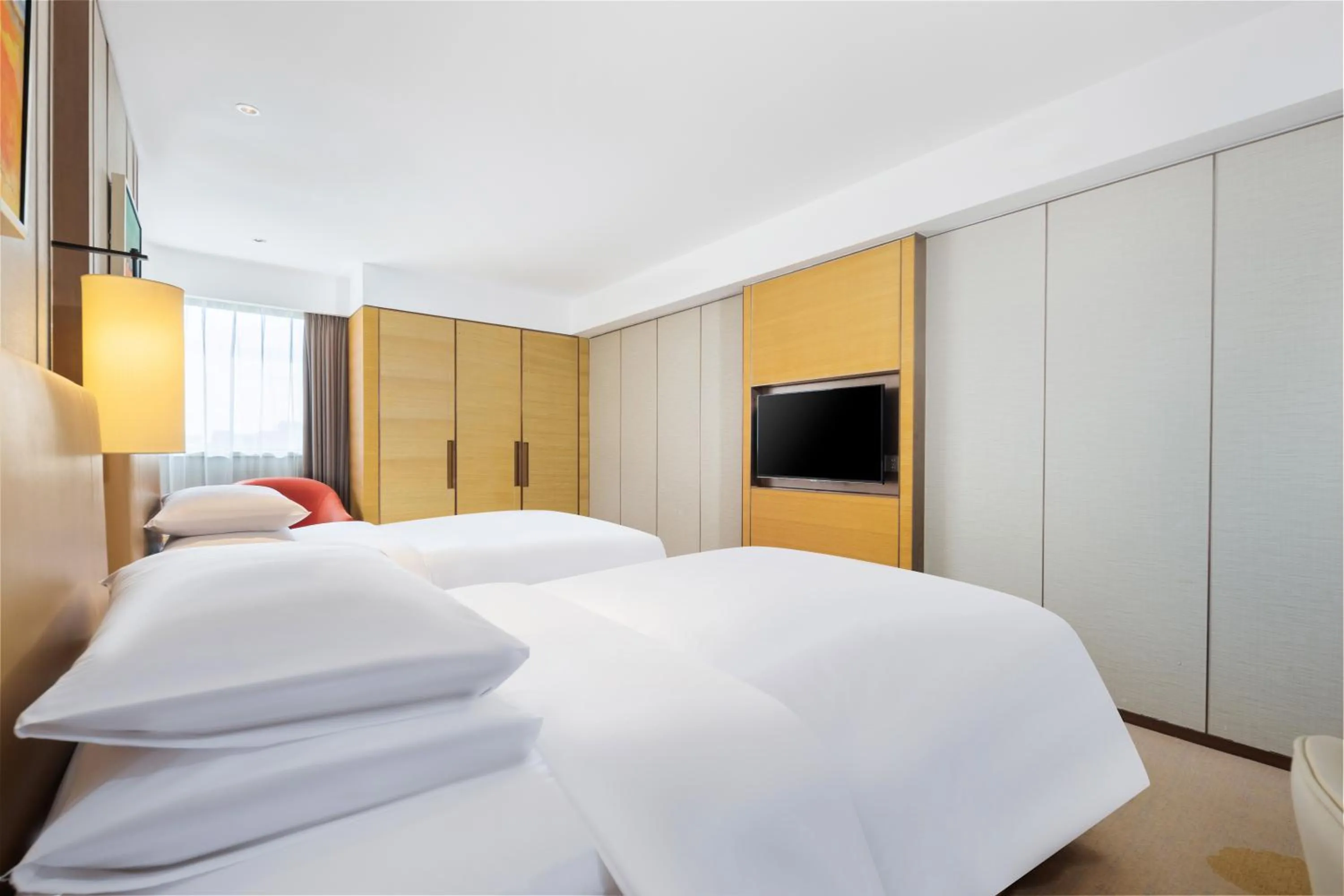 Bed in Grand Metropark Hotel Beijing