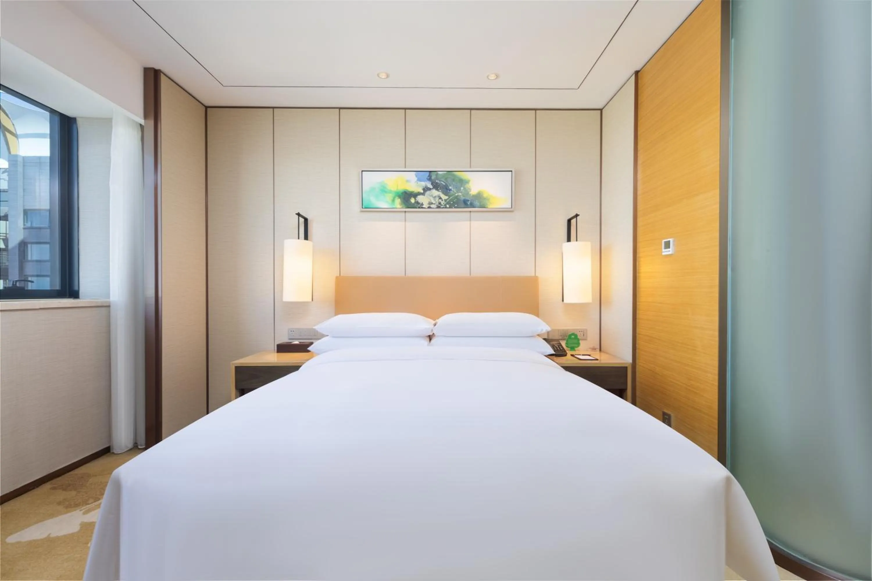 Bed in Grand Metropark Hotel Beijing