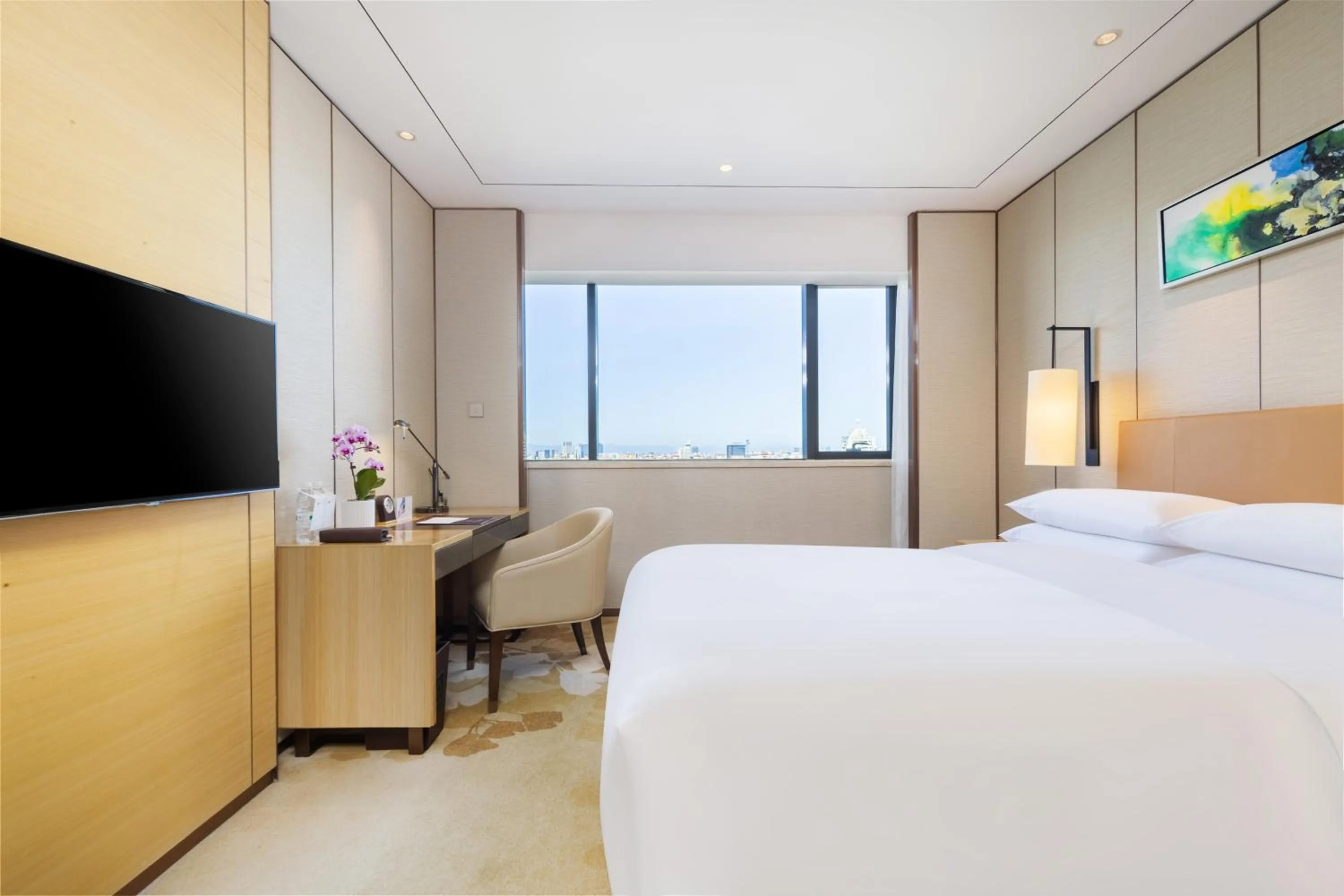 Bed in Grand Metropark Hotel Beijing