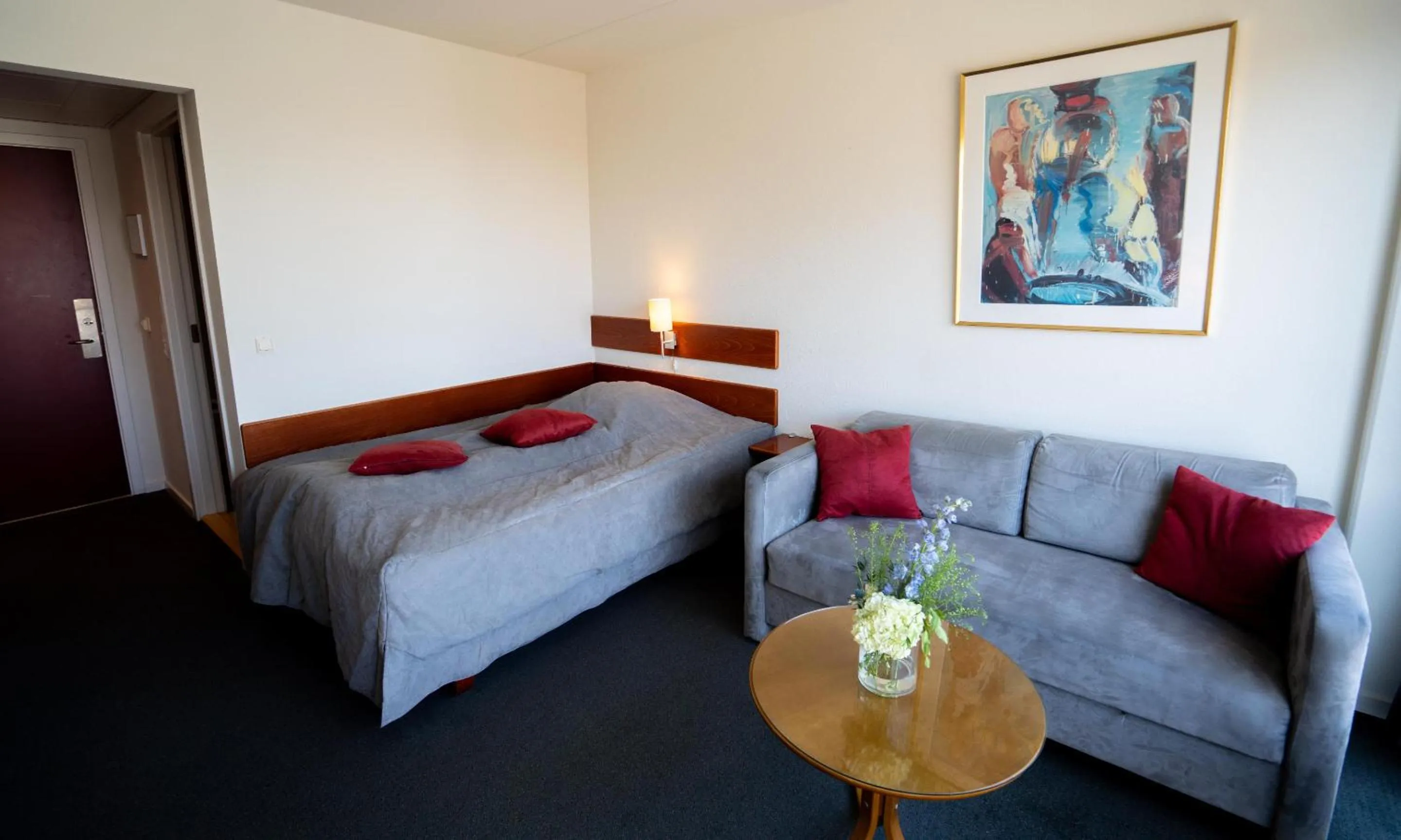 Living room, Bed in Hotel Medi