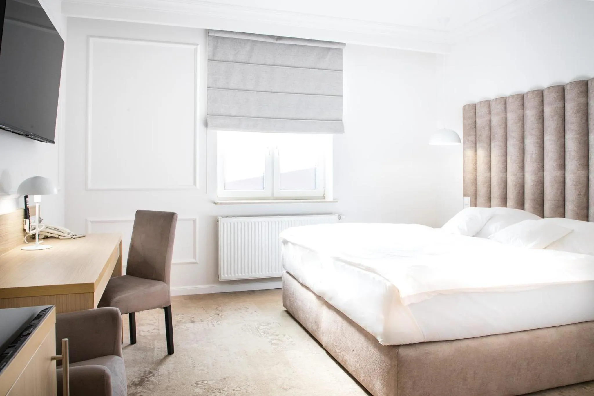 Bed in Europejski Boutique Hotel