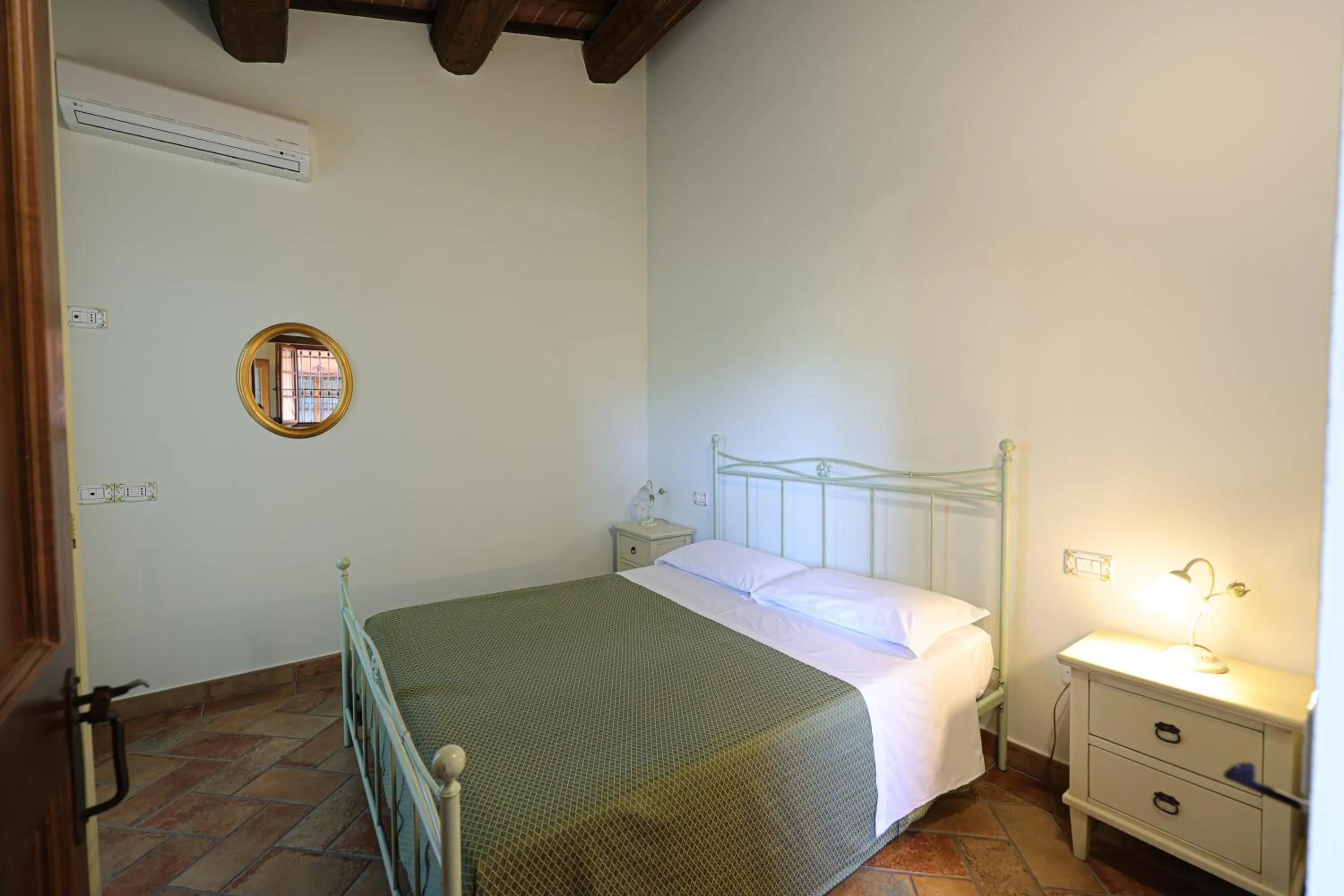 Bed in Valle del Metauro Country House