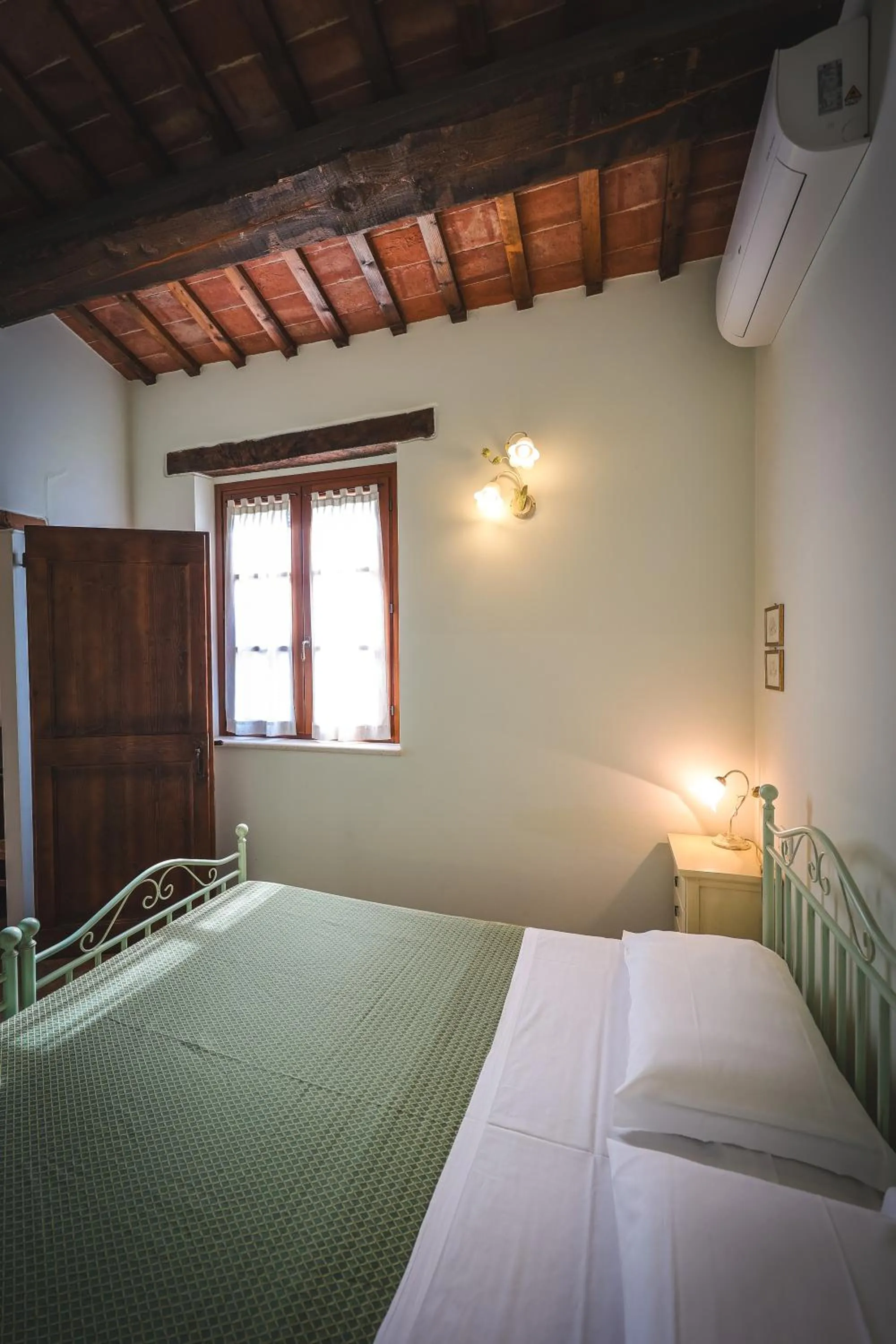 Bed in Valle del Metauro Country House