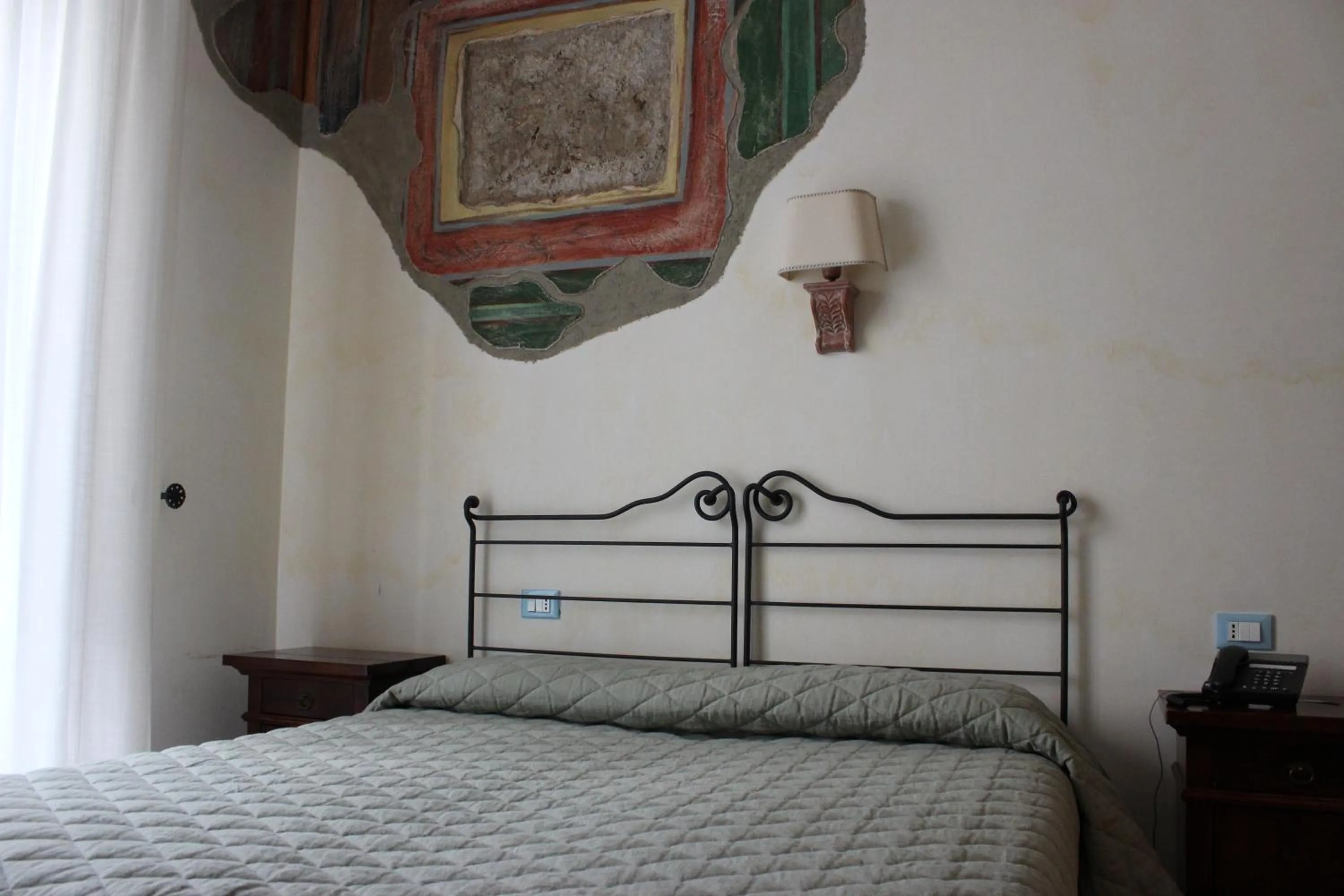 Bed in Villa Cosilinum