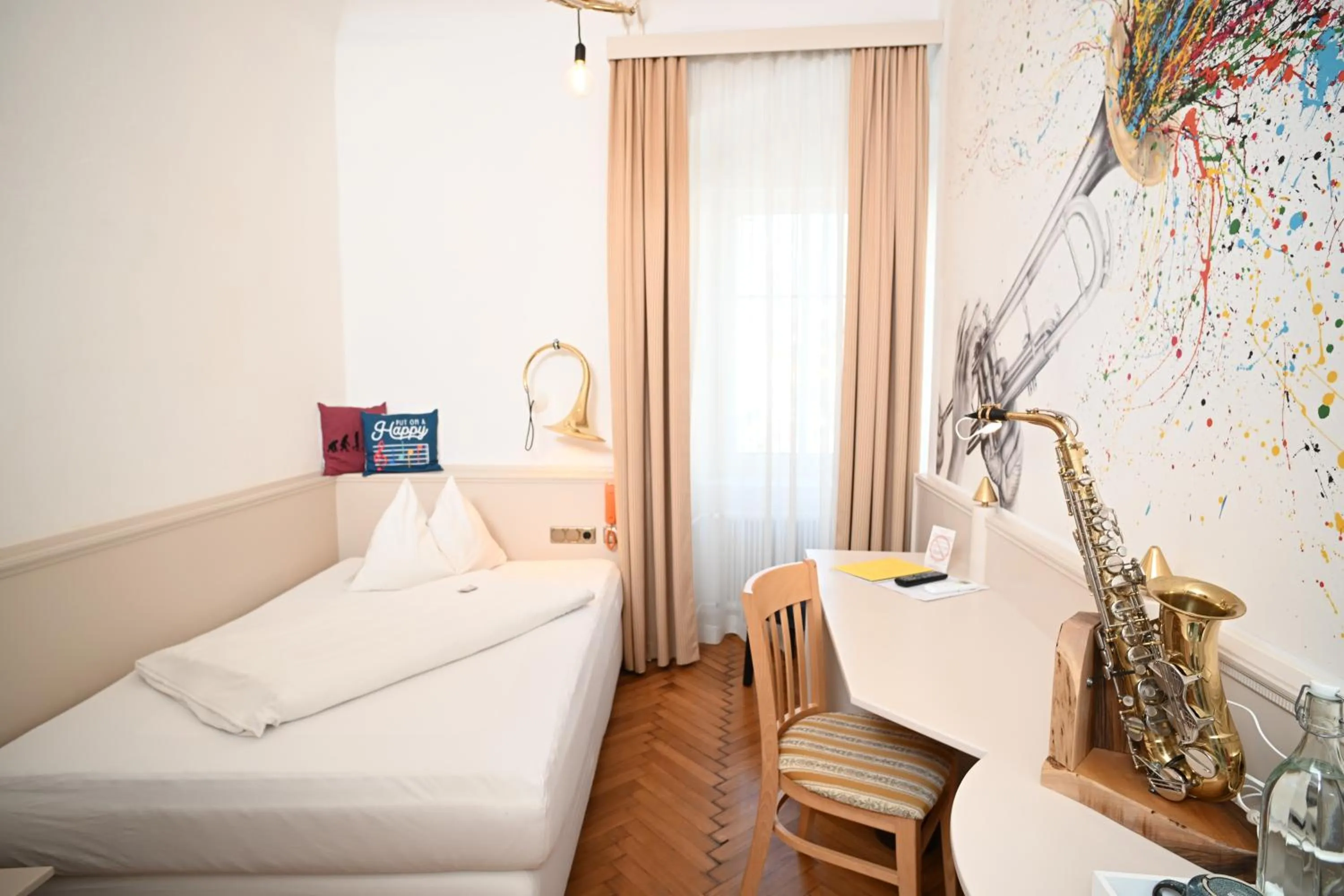 Photo of the whole room, Bed in Boutique Hotel Goldenes Lamm Villach