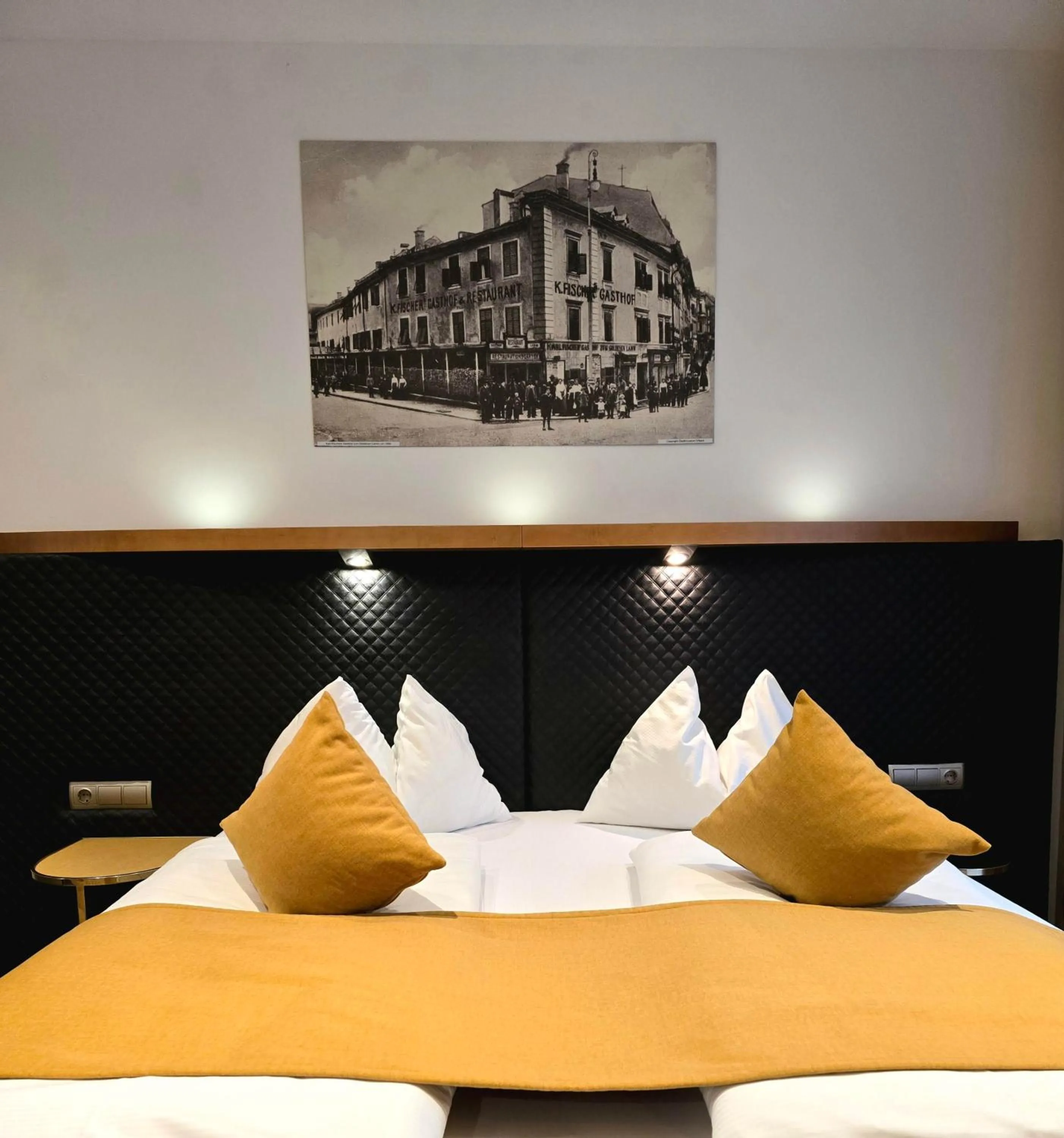 Photo of the whole room, Bed in Boutique Hotel Goldenes Lamm Villach