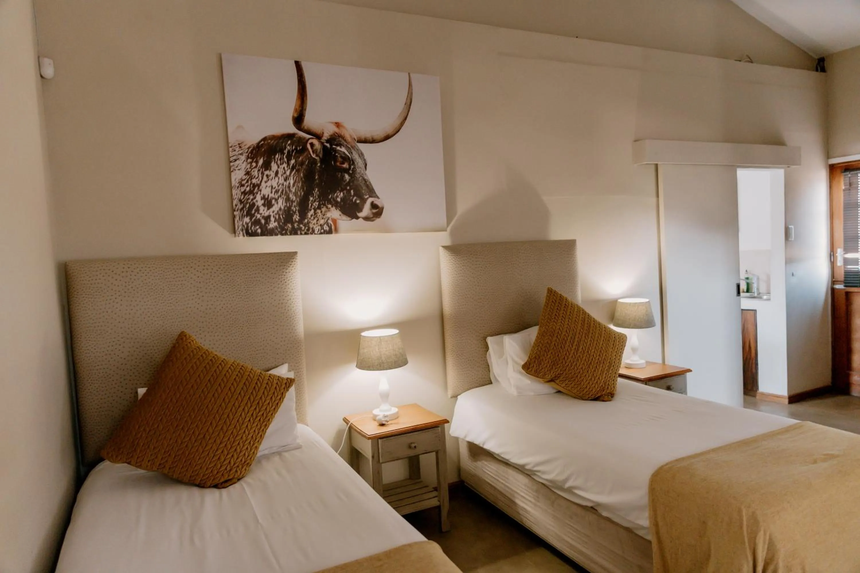 Bed in Chandelier Game Lodge