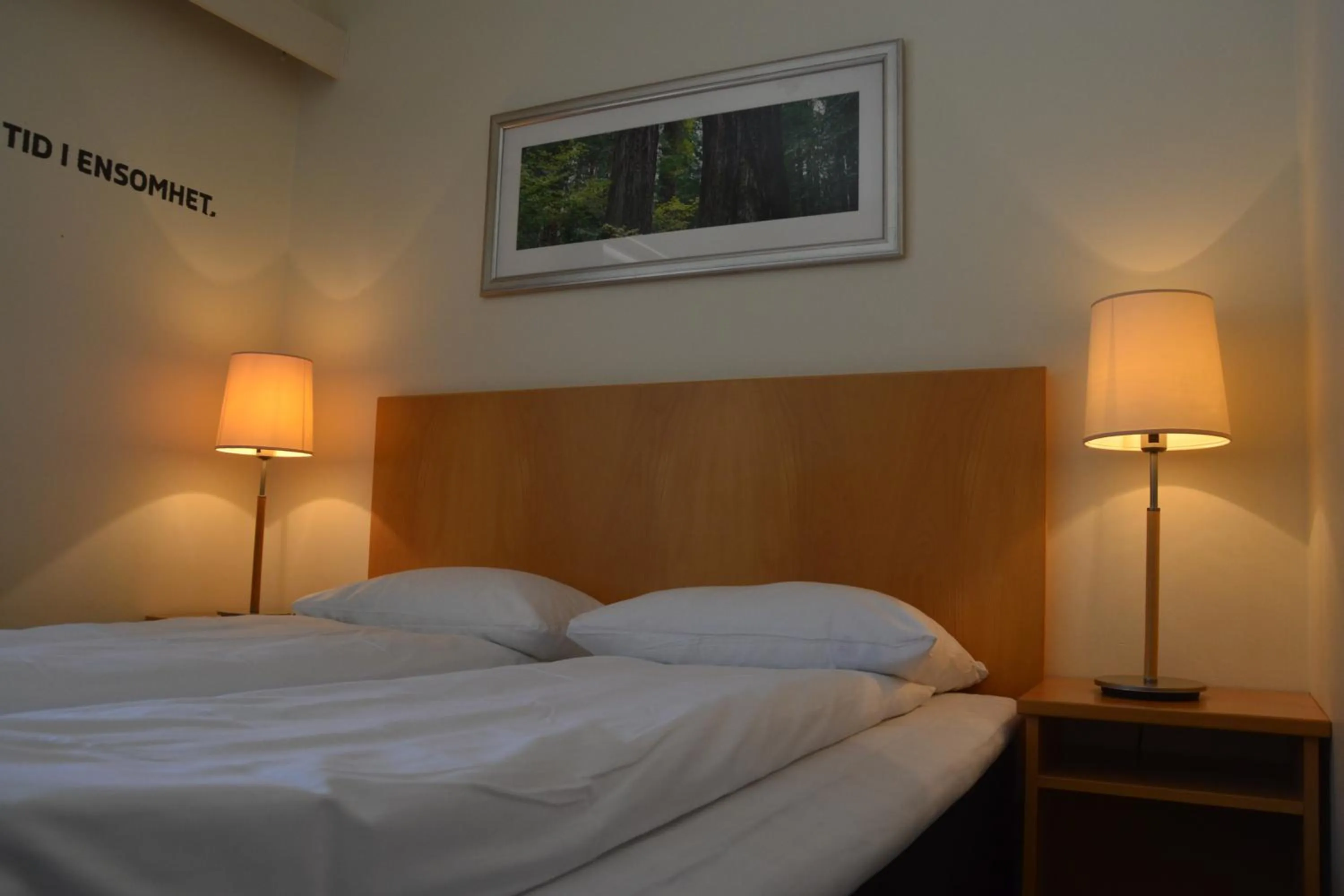 Bed in Utsikten Hotell Kvinesdal - Unike Hoteller