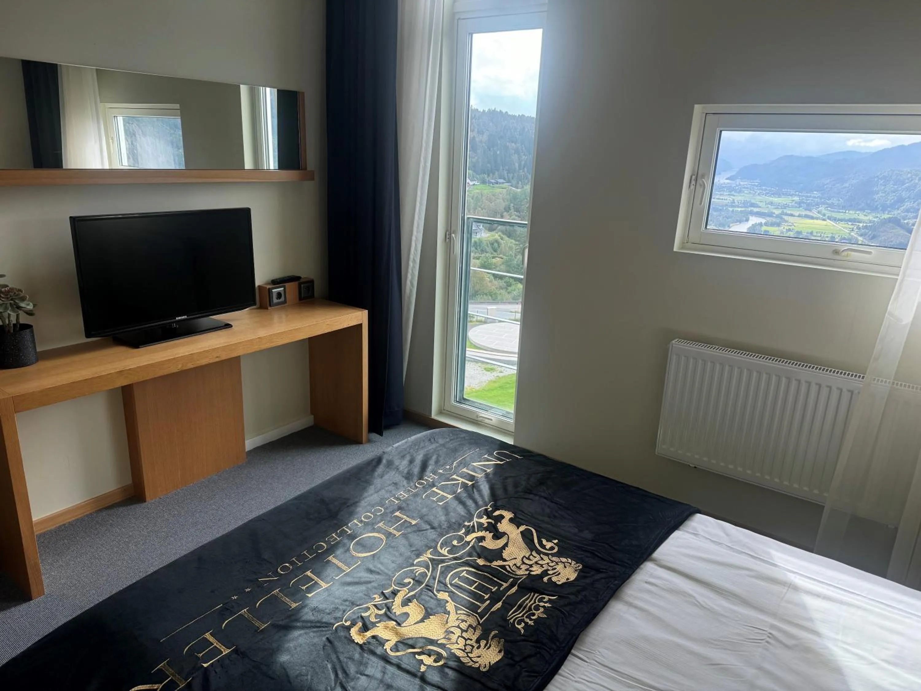 Photo of the whole room, Bed in Utsikten Hotell Kvinesdal - Unike Hoteller