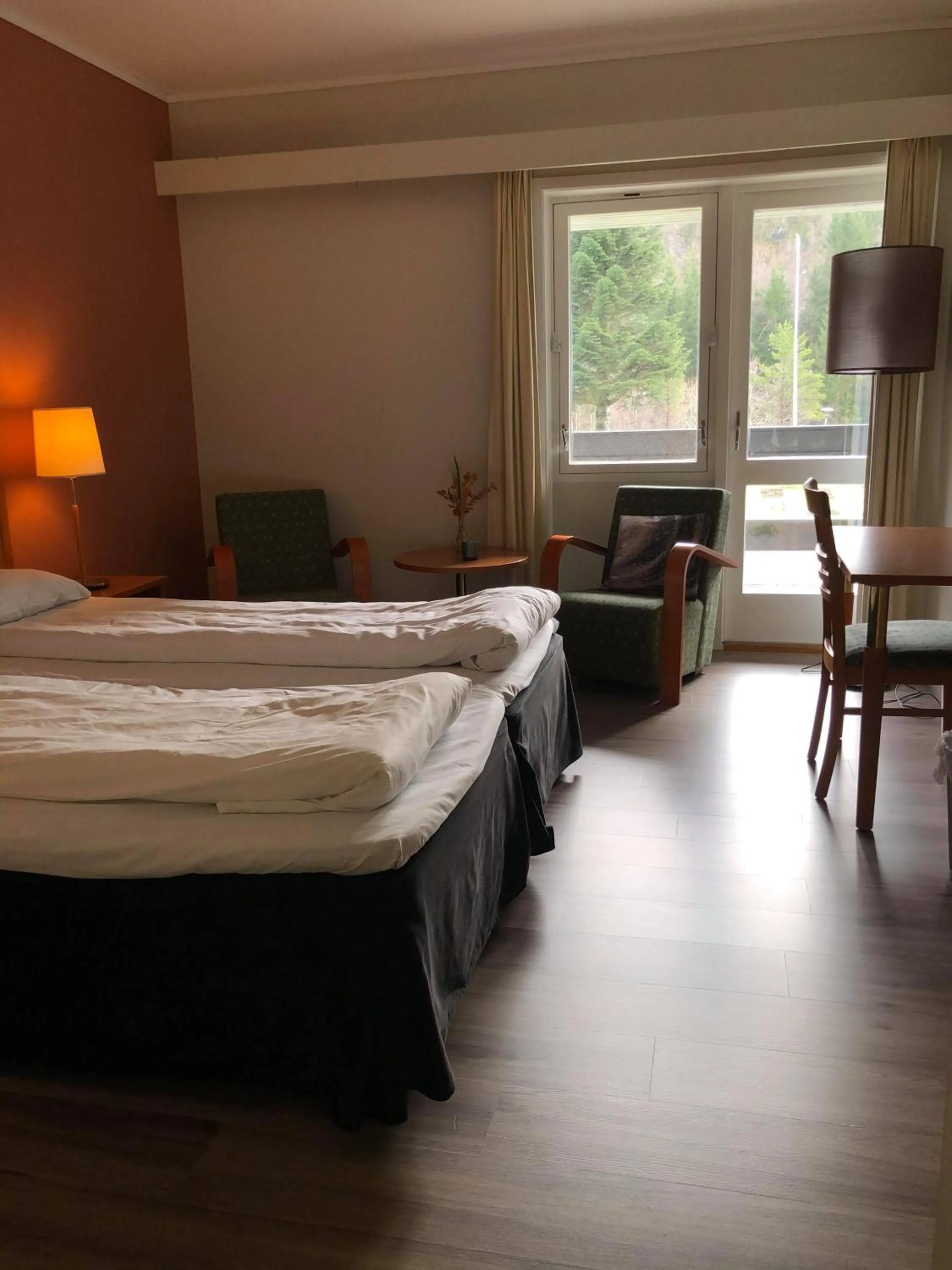 Bed in Utsikten Hotell Kvinesdal - Unike Hoteller