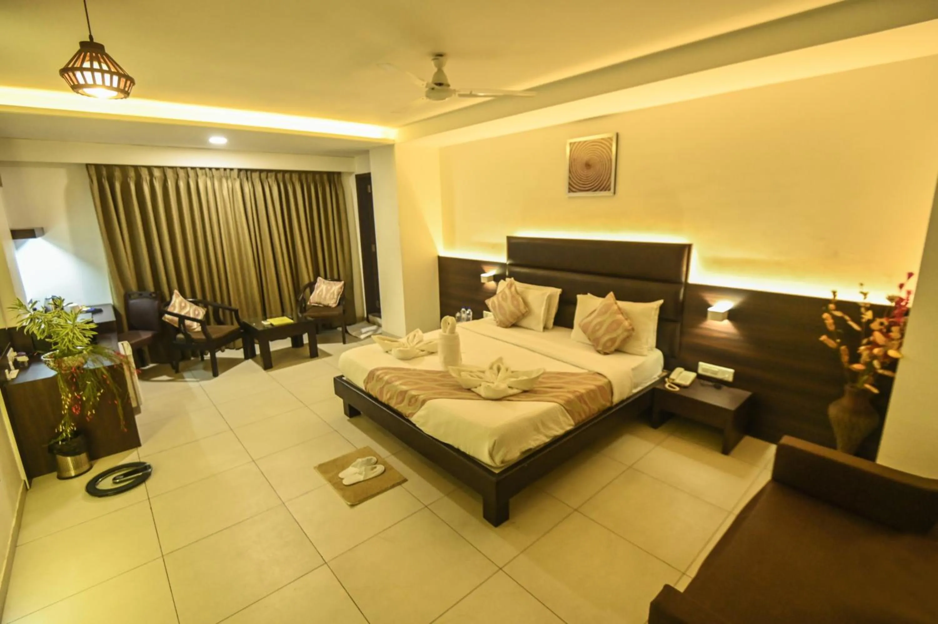 Photo of the whole room, Bed in The Divine Resort Somnath
