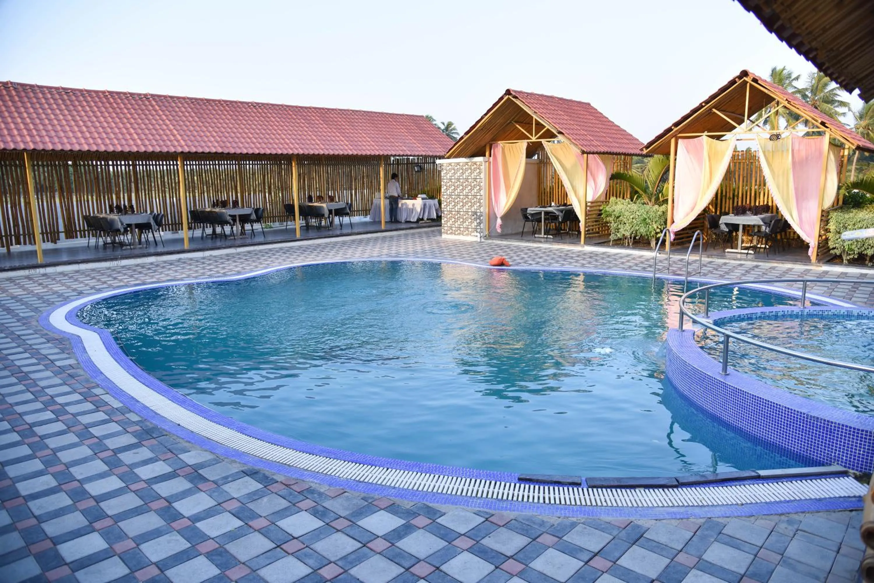 Swimming pool in The Divine Resort Somnath
