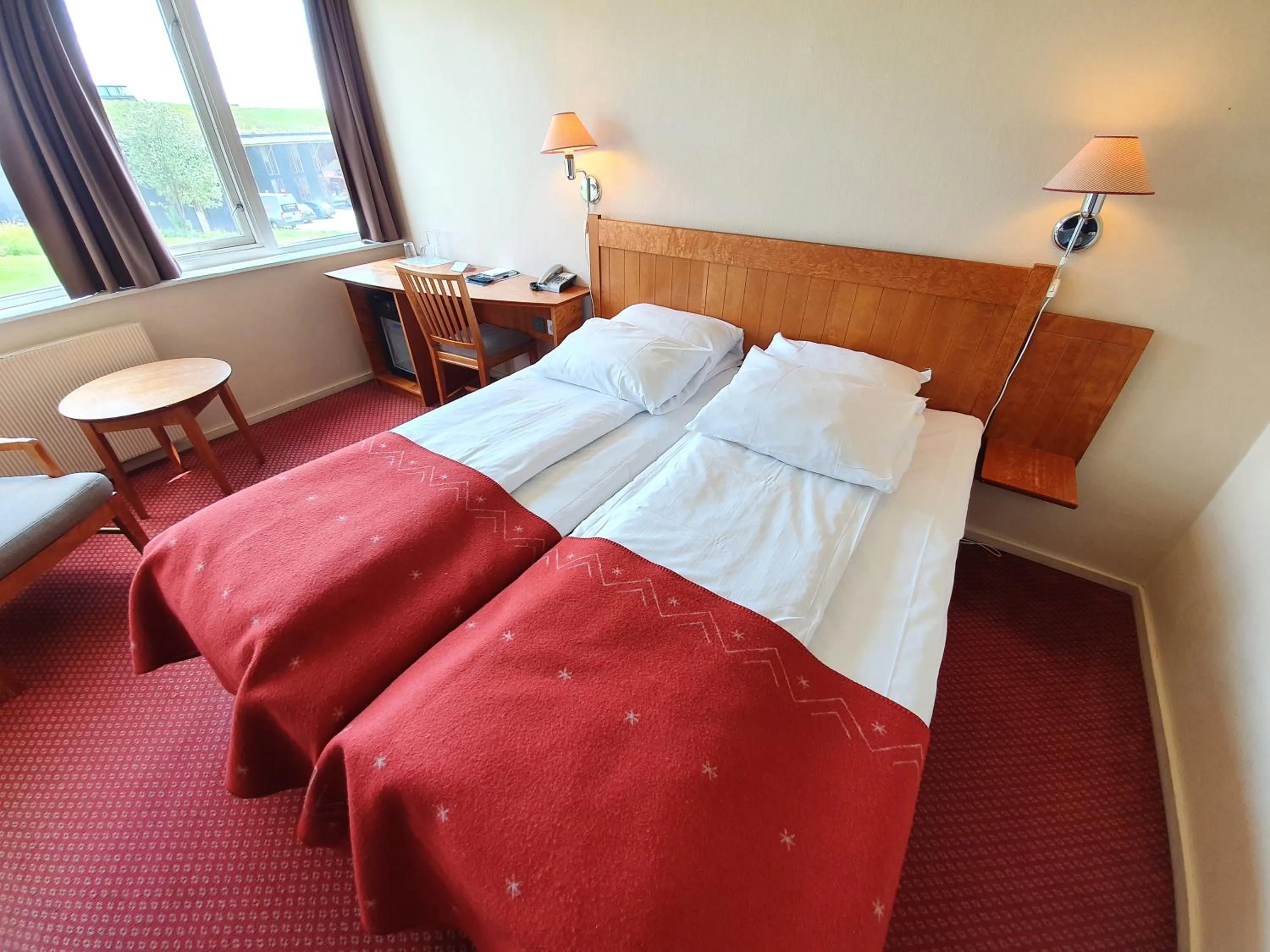 Bedroom, Bed in Røros Hotell - Bad & Velvære