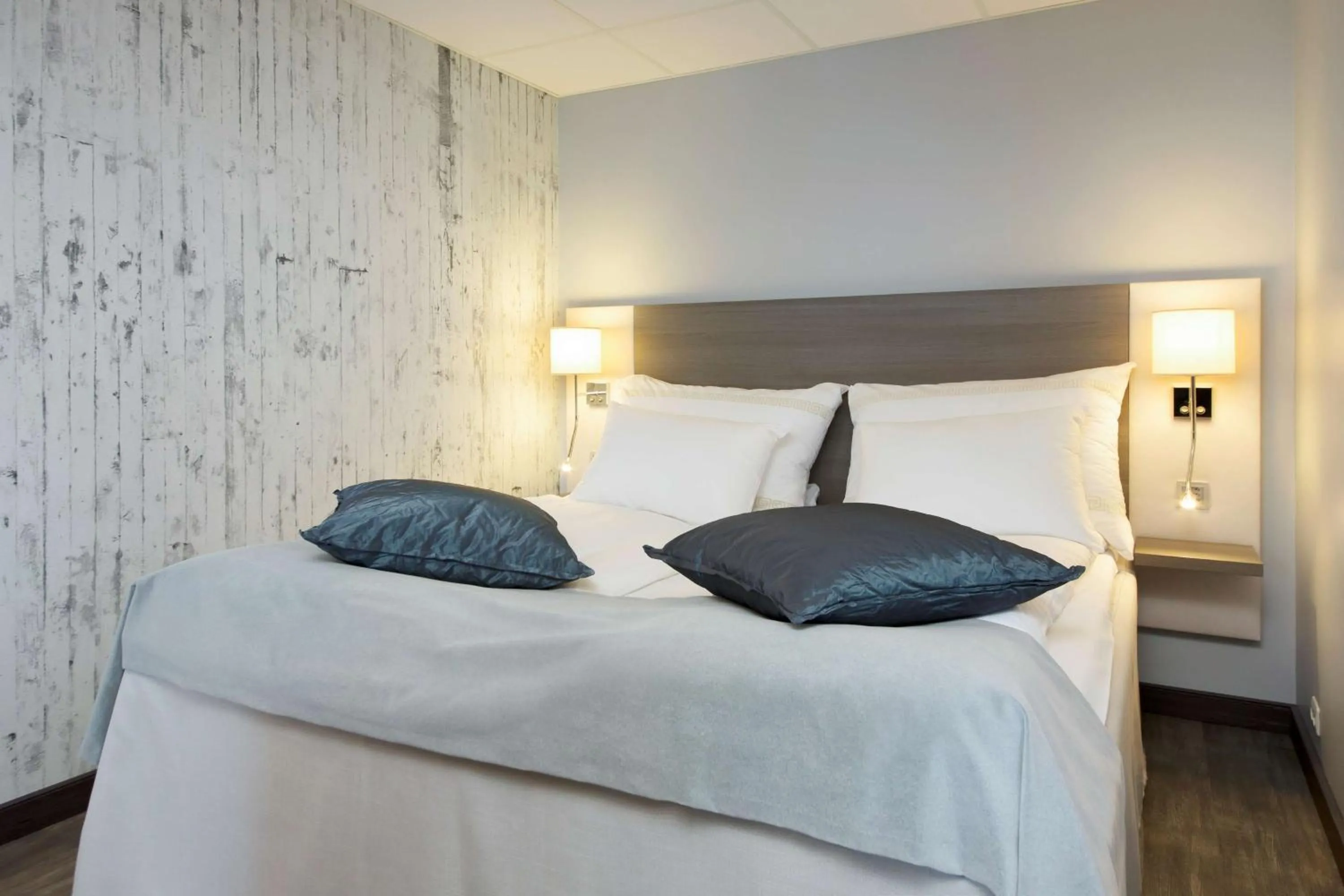 Photo of the whole room, Bed in Scandic Grand Tromsø