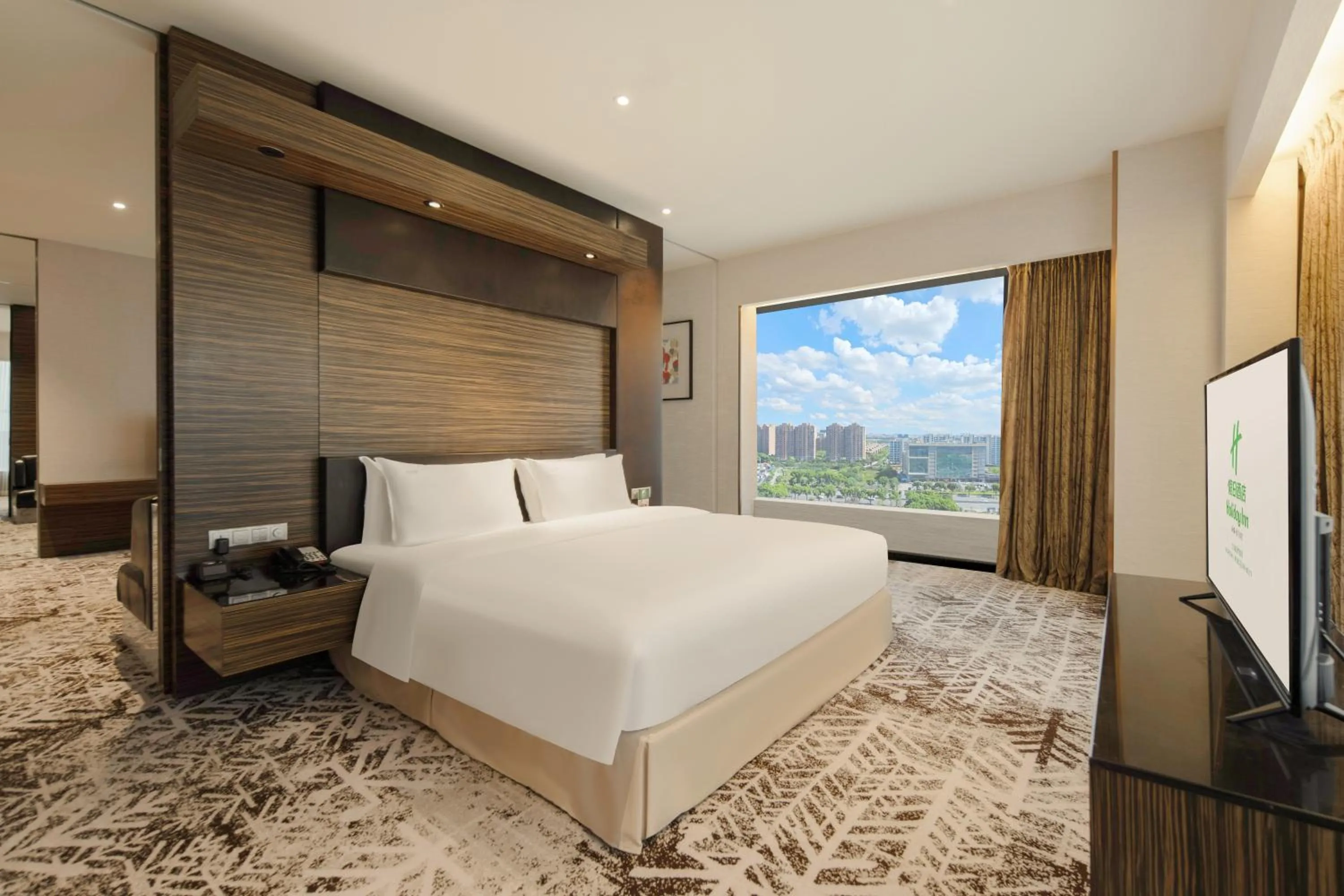 Bedroom in Holiday Inn Shanghai Hongqiao West by IHG