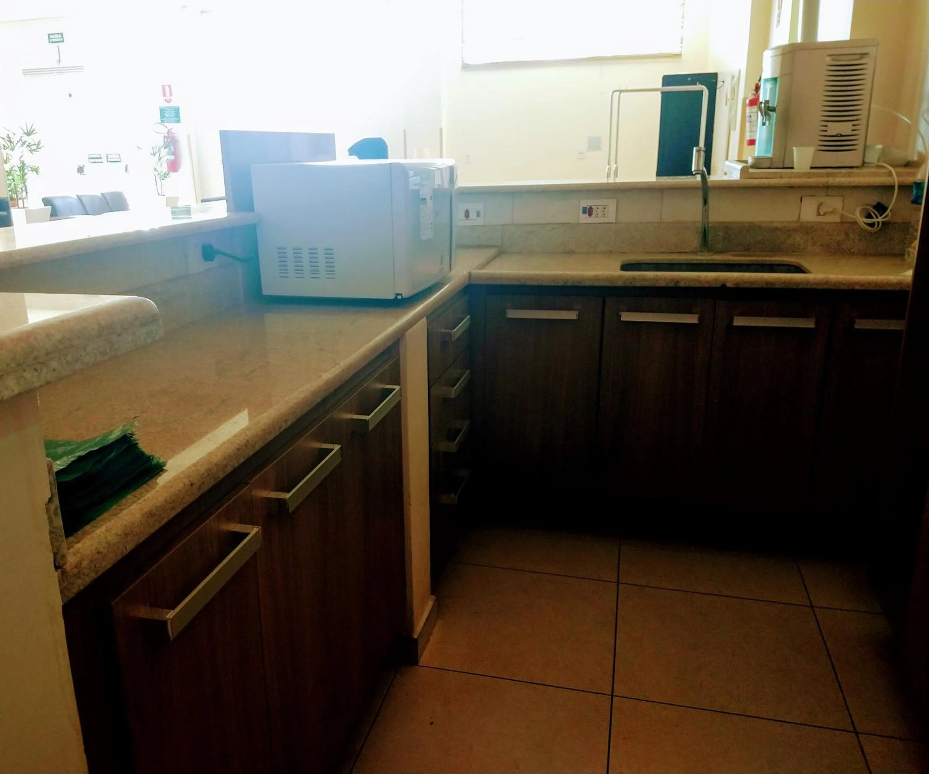 Kitchen or kitchenette in Tiffany Hotel