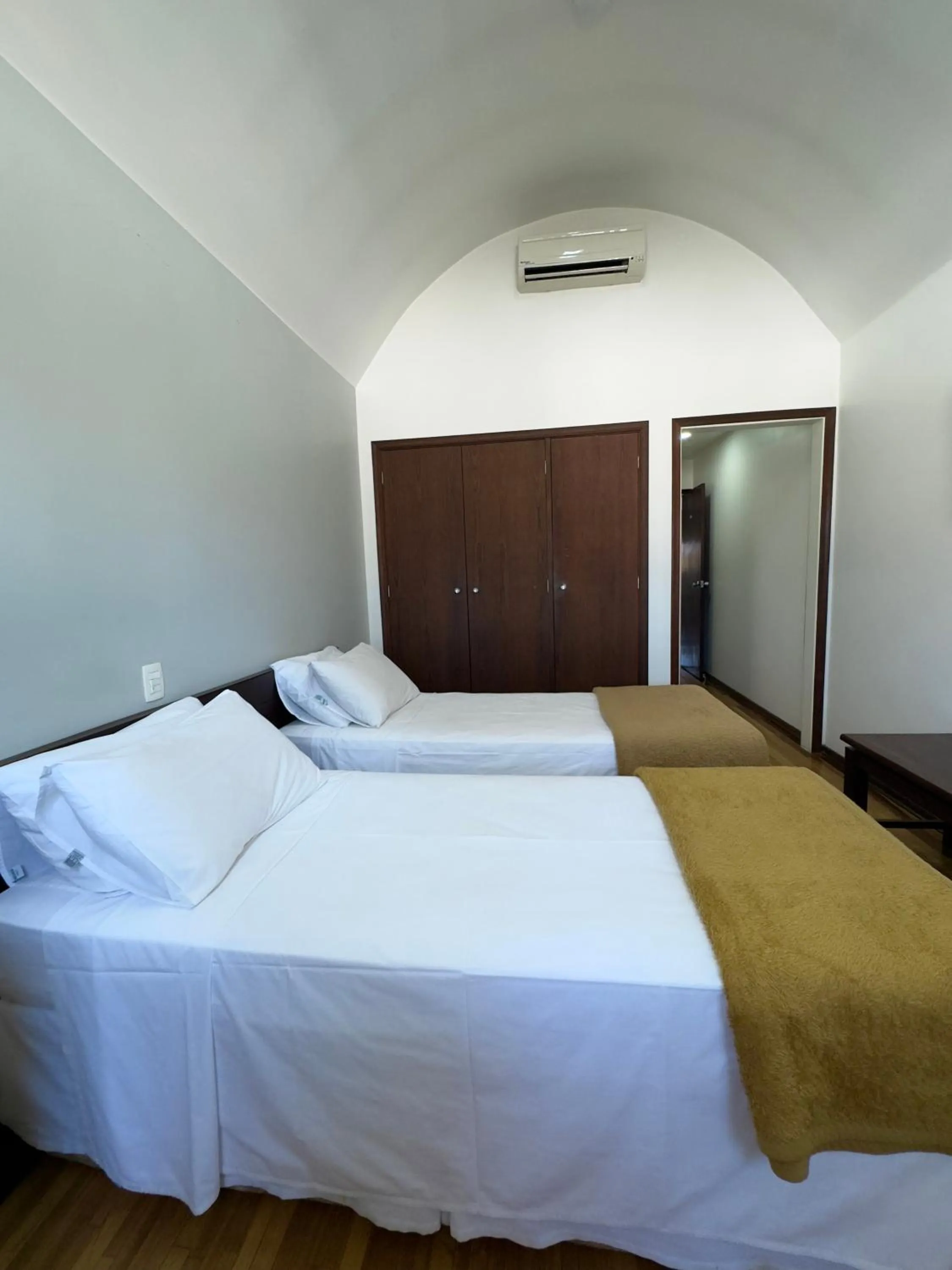 Bed in Arcadas Hotel