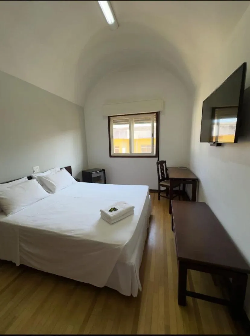 Bed in Arcadas Hotel