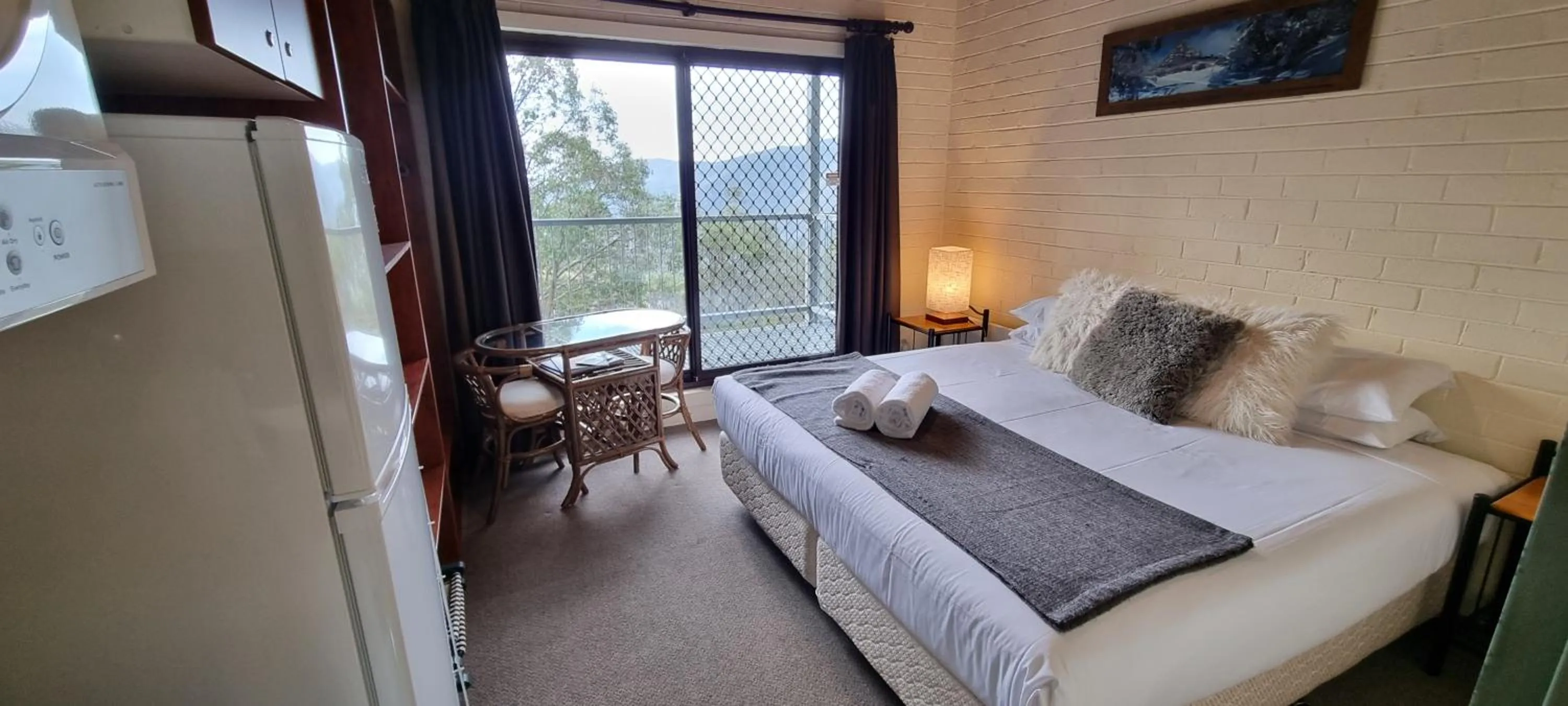 Bed in Cedarwood Apartments