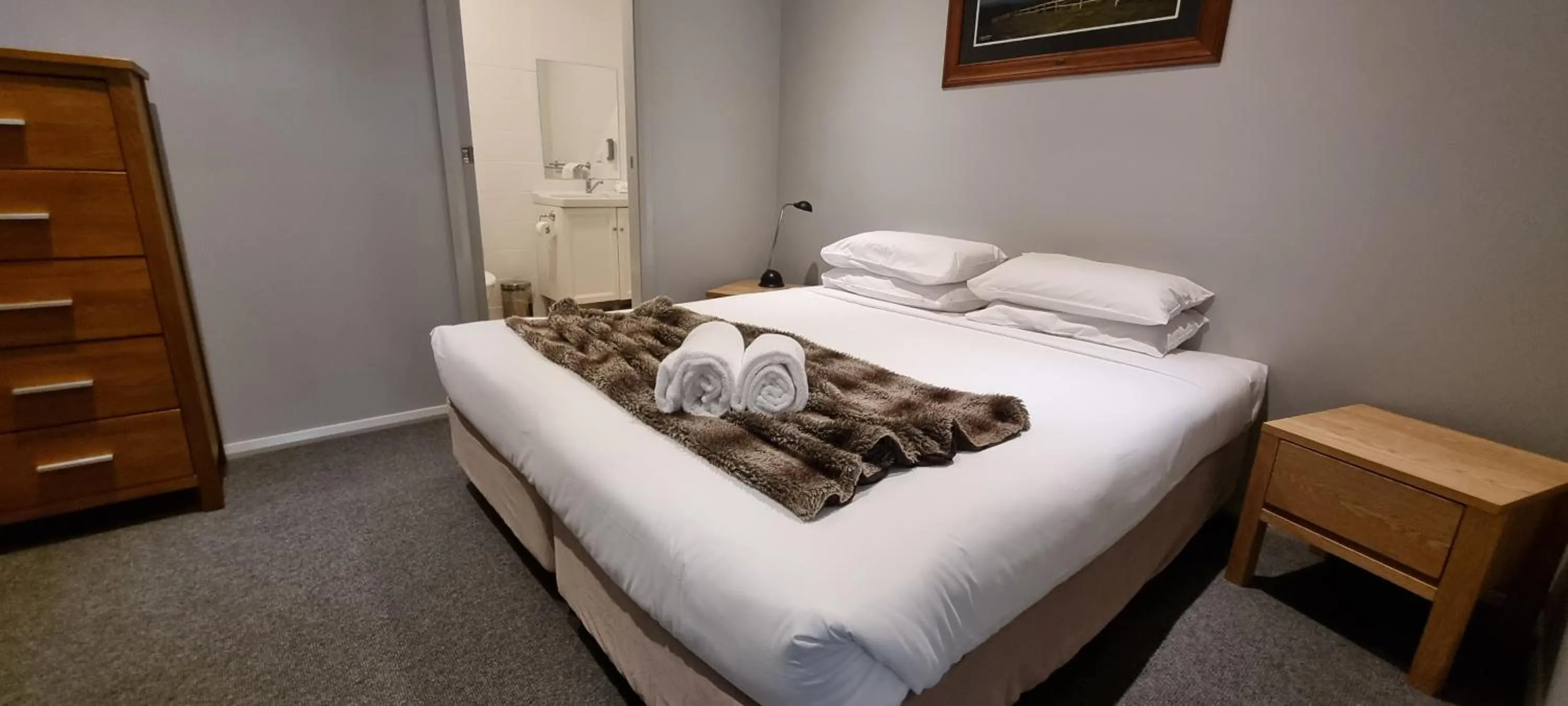 Bed in Cedarwood Apartments