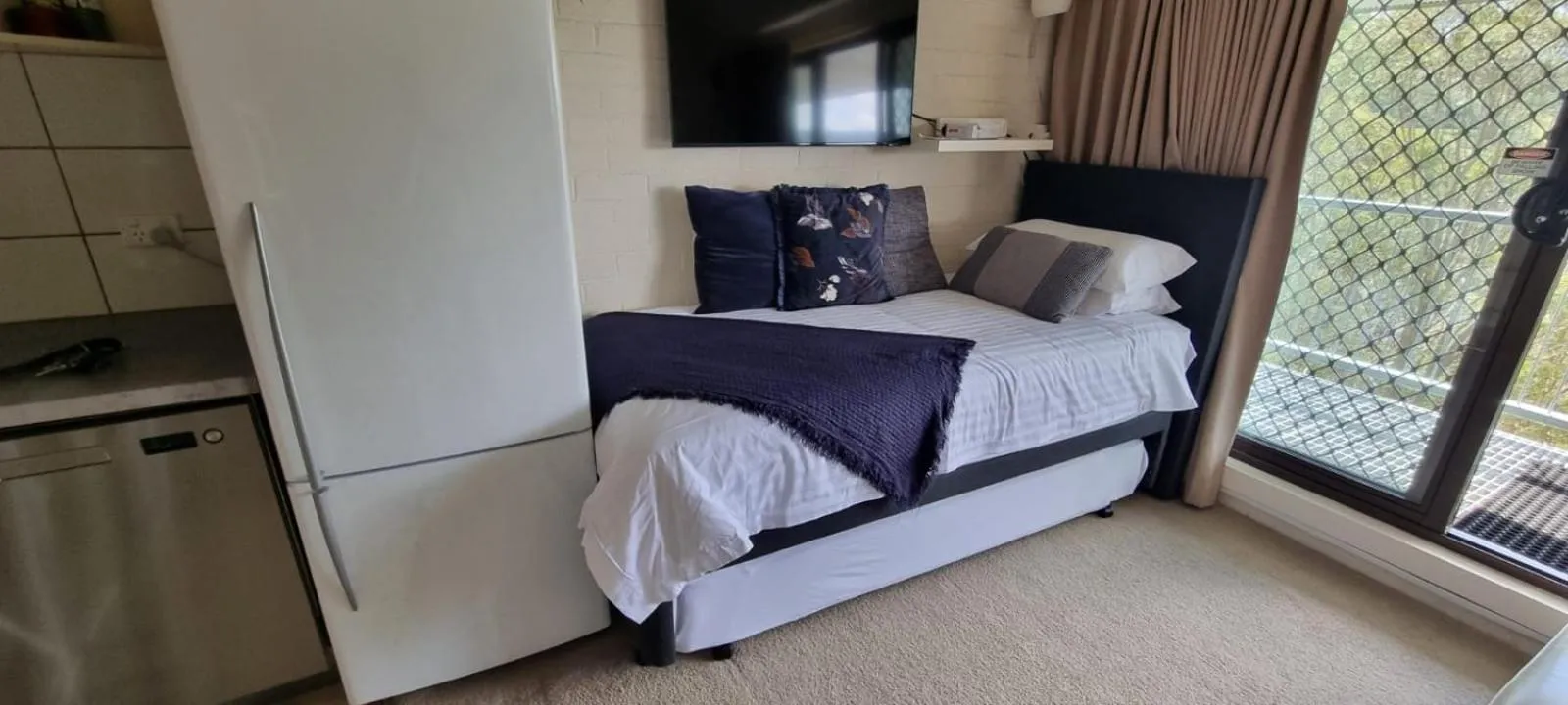 Bed in Cedarwood Apartments