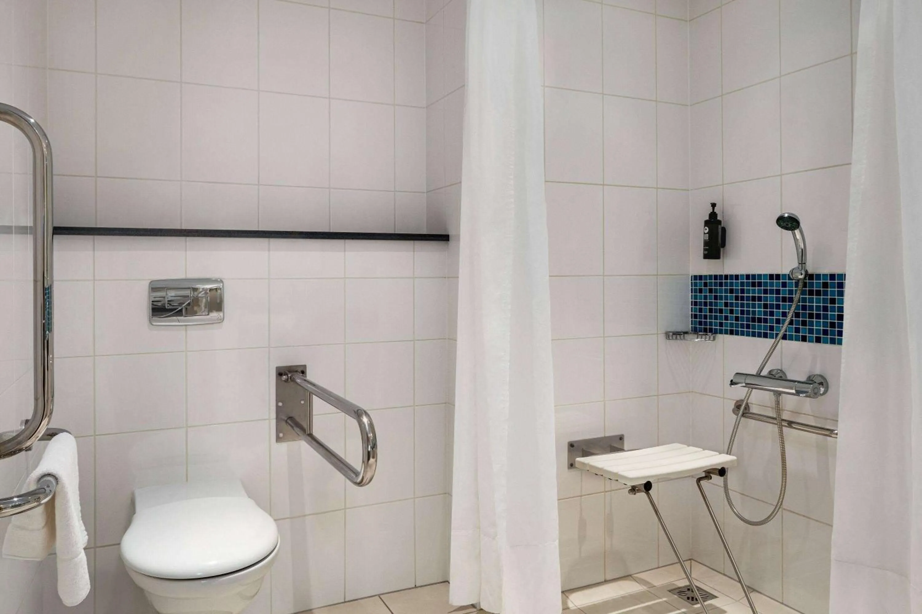 Shower in Vienna House Easy by Wyndham Bratislava