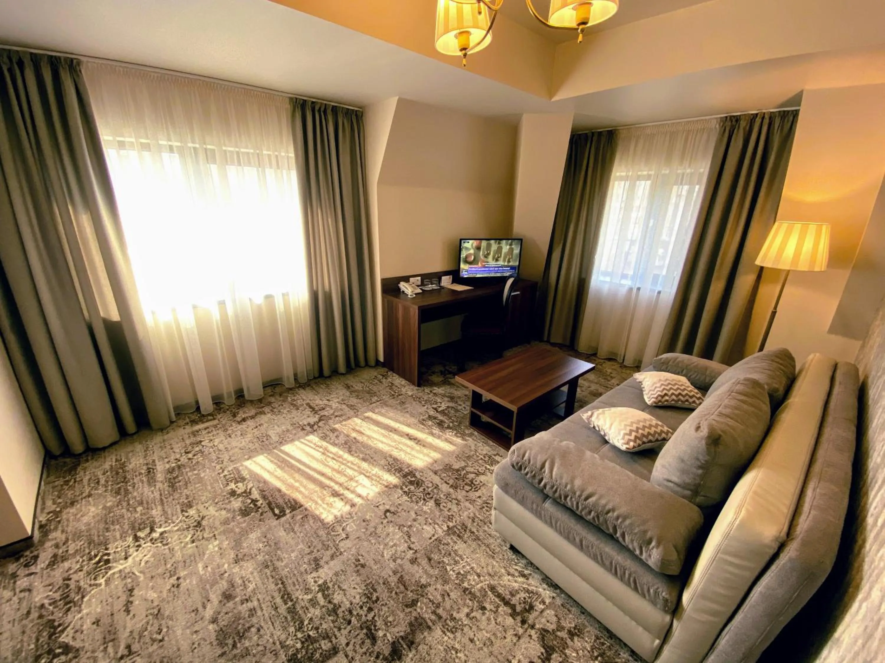 Living room, Bed in Hotel Arnia