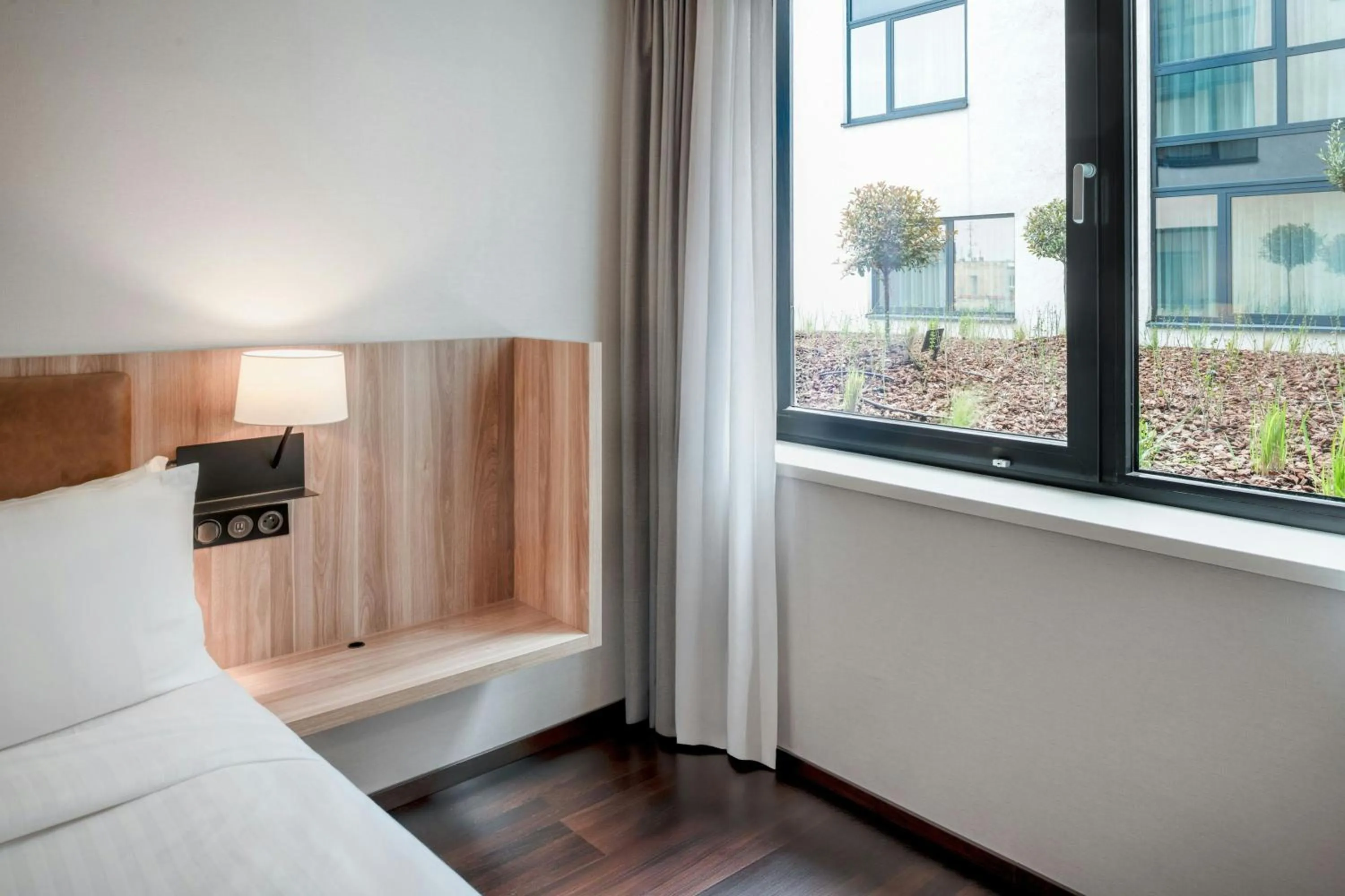 Photo of the whole room, Bed in AC Hotel by Marriott Bratislava Old Town