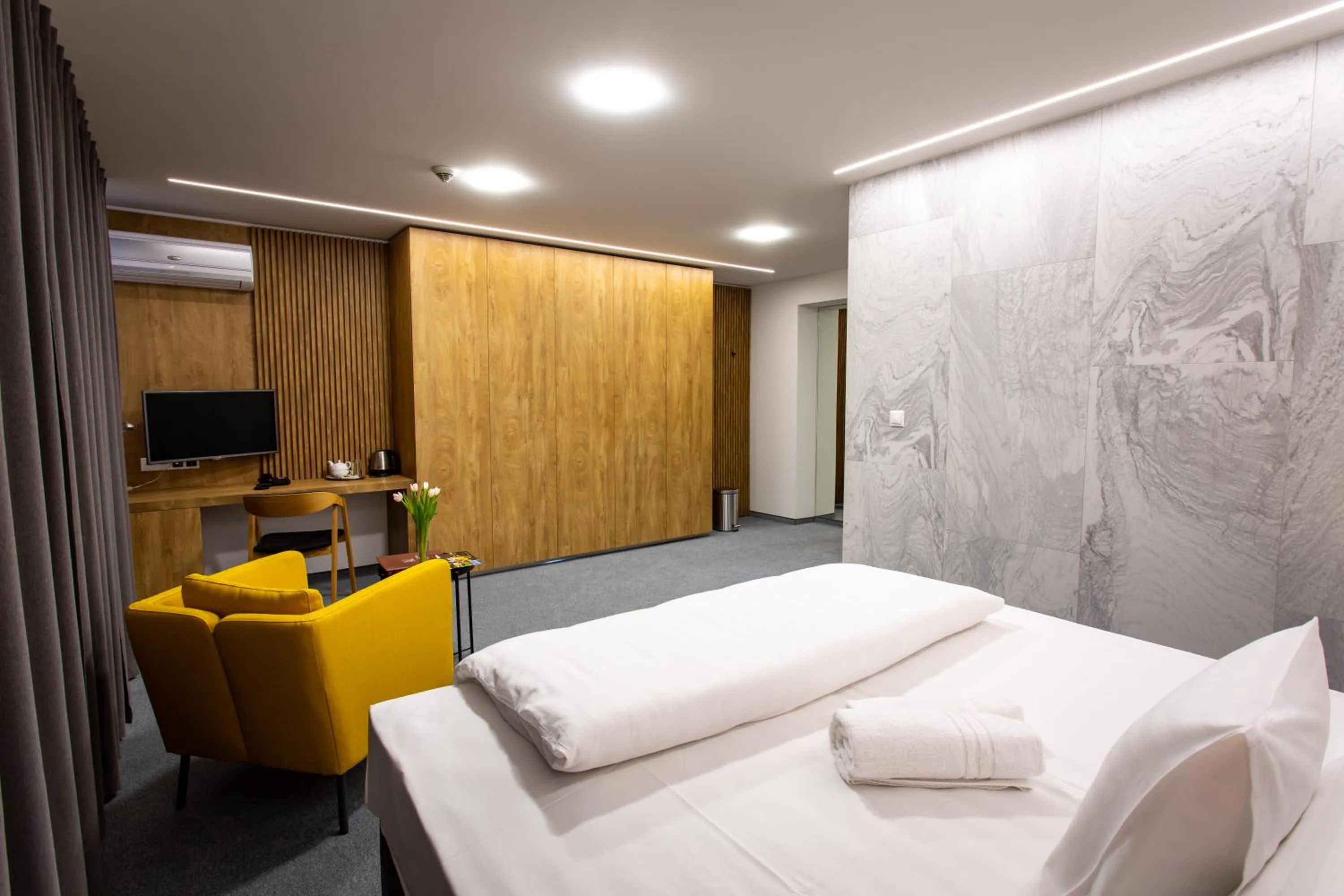 Photo of the whole room, Bed in Hotel Novy Kastiel - Self check-in