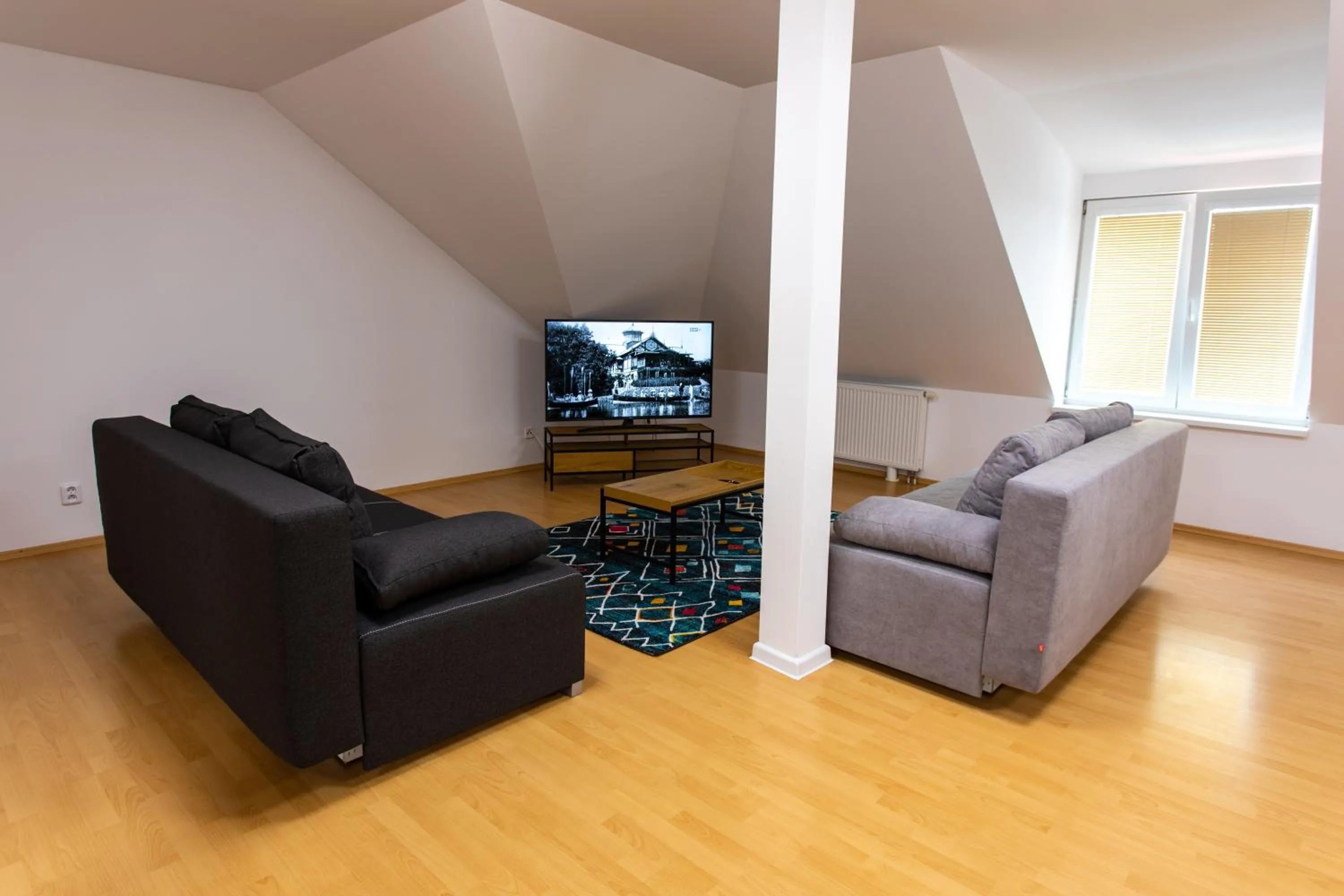 Communal lounge/ TV room in Hotel Novy Kastiel - Self check-in