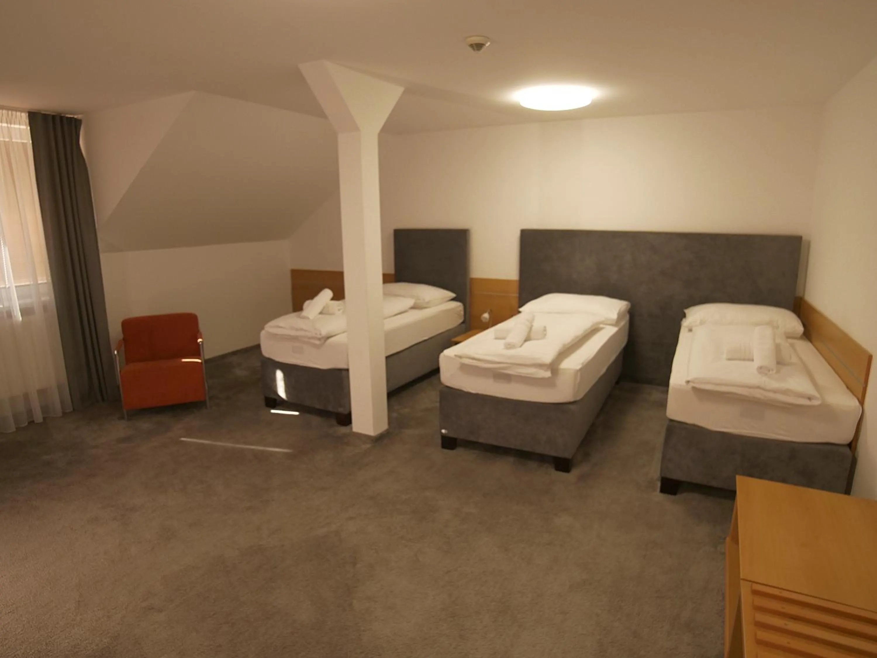 Photo of the whole room, Bed in Hotel Novy Kastiel - Self check-in