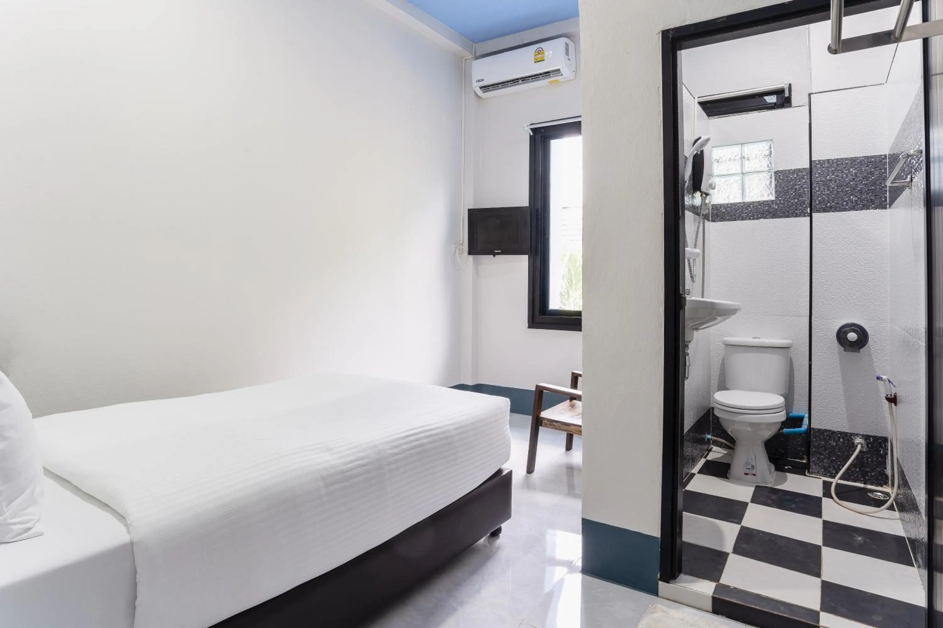 Bed in Udomsuk Hotel